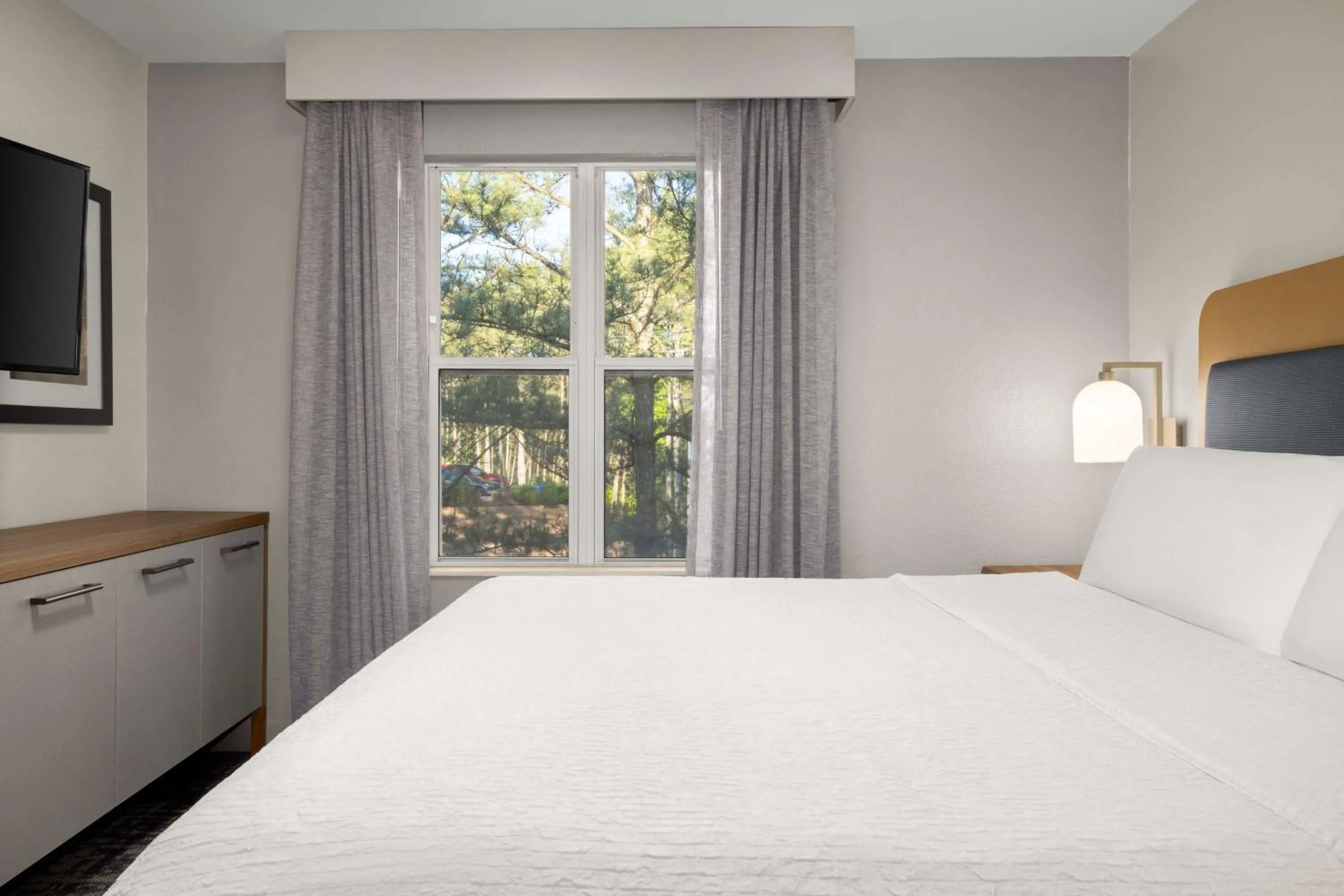 Bed in Homewood Suites by Hilton Atlanta-Alpharetta