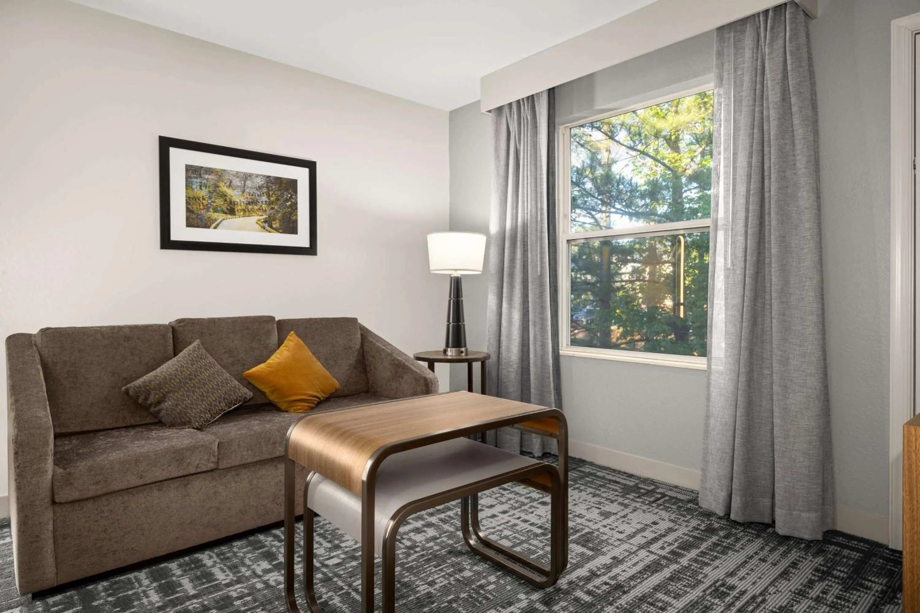 Living room in Homewood Suites by Hilton Atlanta-Alpharetta