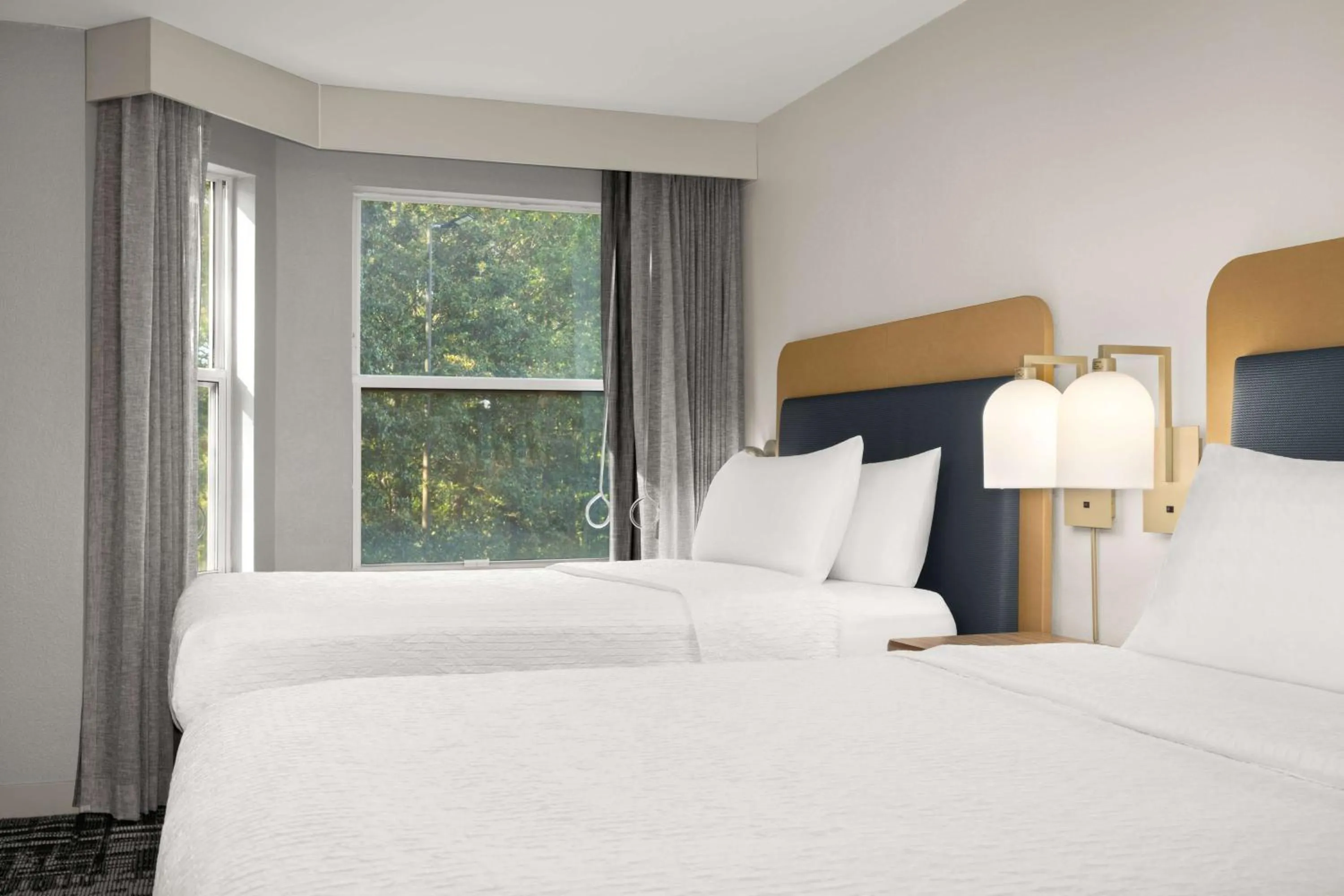Bed in Homewood Suites by Hilton Atlanta-Alpharetta
