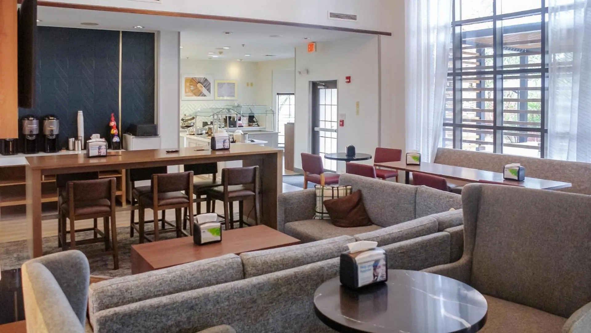 Seating area in Staybridge Suites Omaha 80th and Dodge by IHG