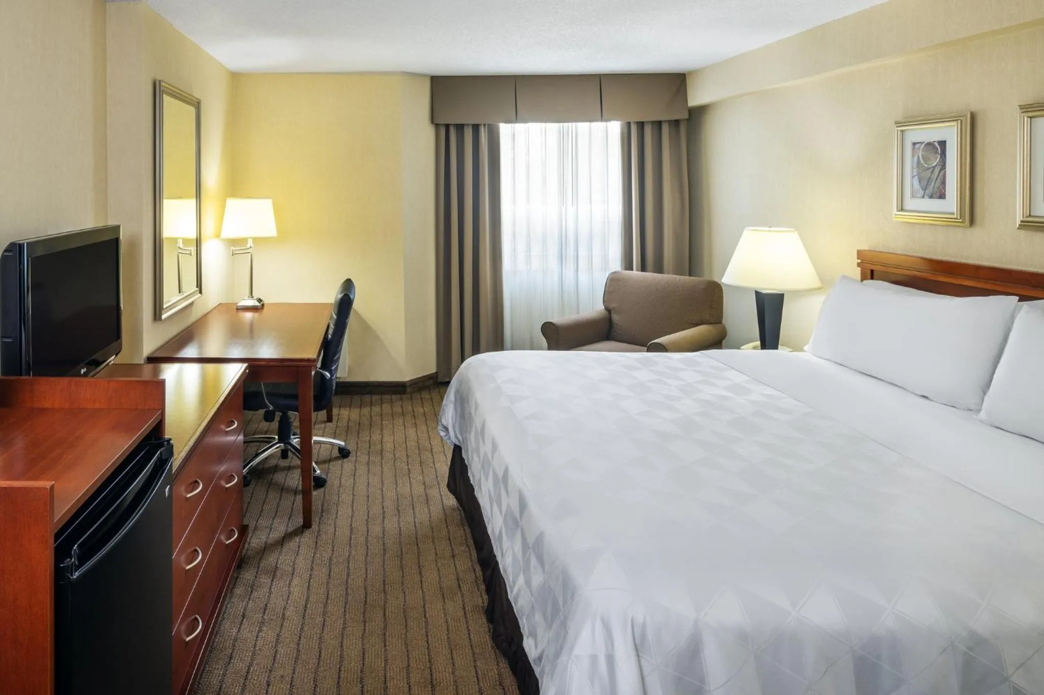 Photo of the whole room, Bed in Holiday Inn Laval Montreal by IHG