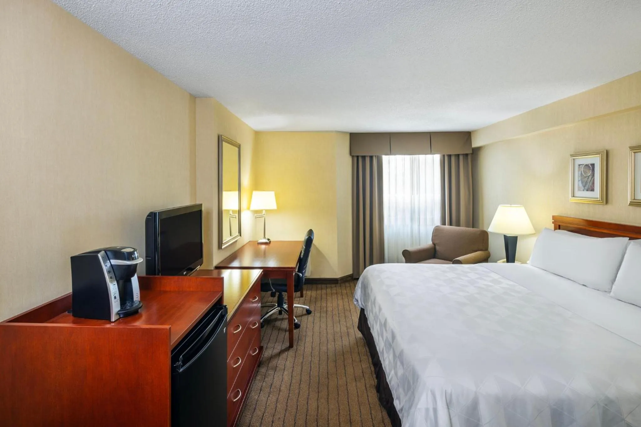 Photo of the whole room, Bed in Holiday Inn Laval Montreal by IHG