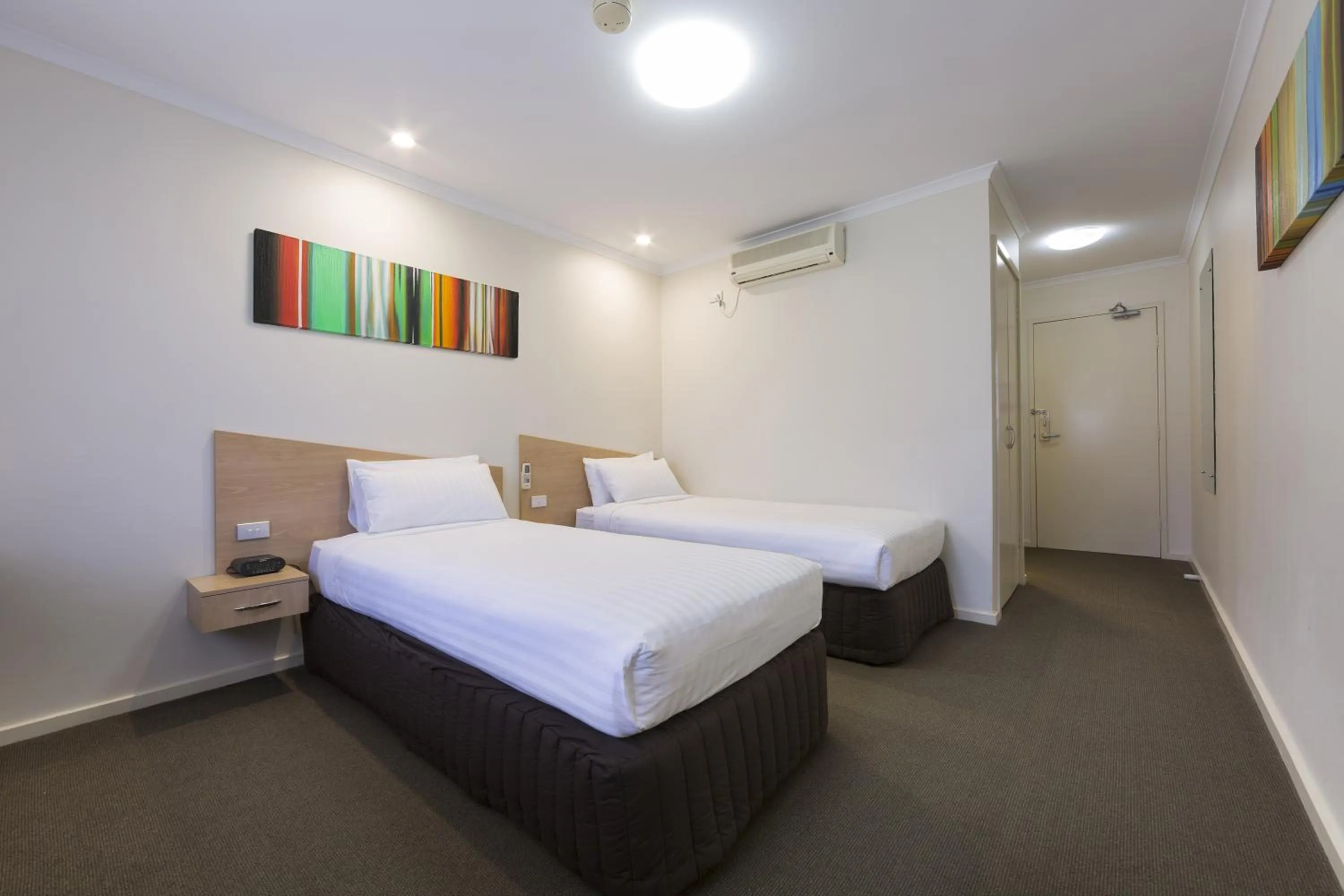 Bed in Ramada Encore by Wyndham Belconnen Canberra