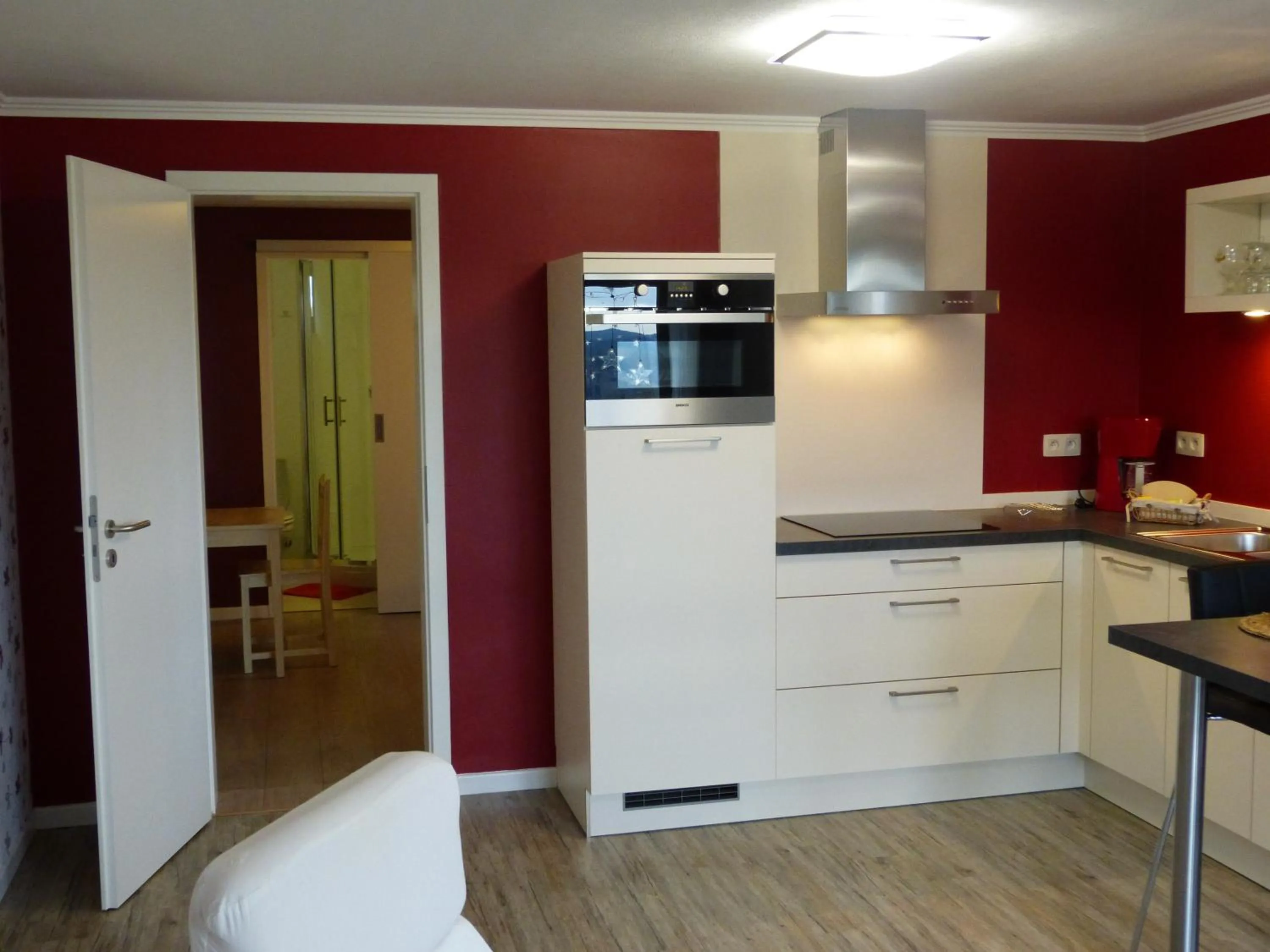 Kitchen or kitchenette in L'Horizon Studios & Apparts