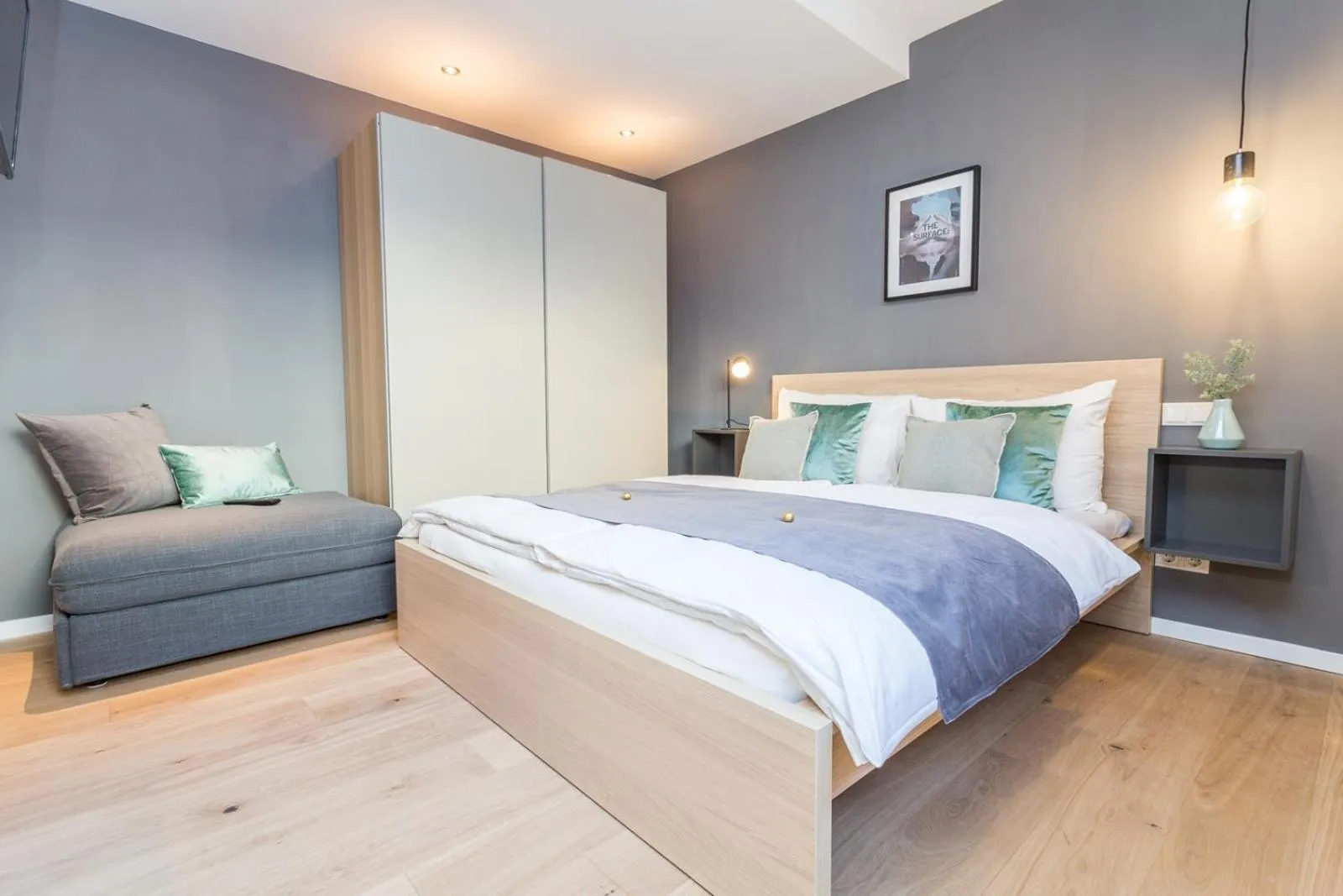 Seating area, Bed in Room 4 & 5 Apartments