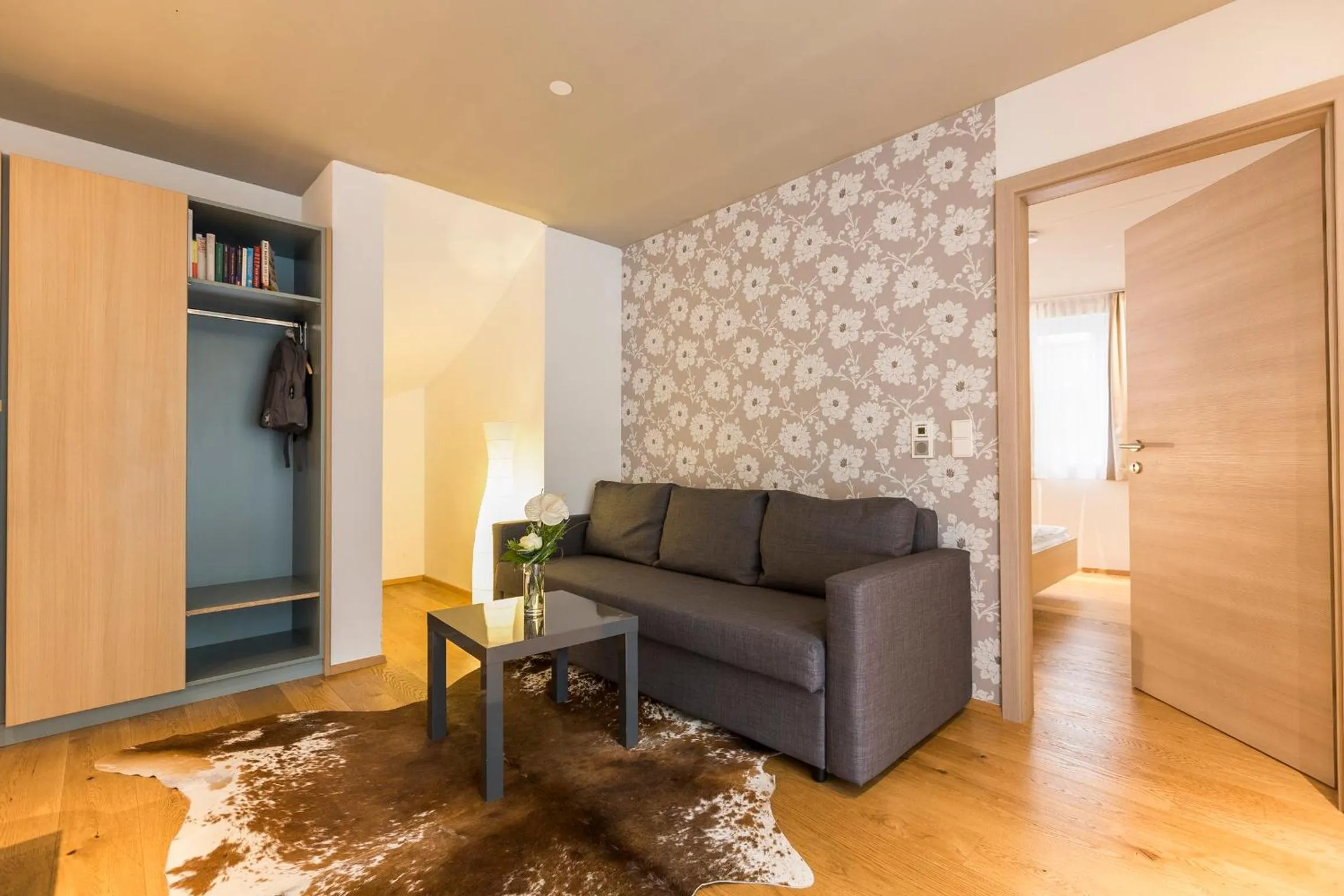 Living room in Room 4 & 5 Apartments