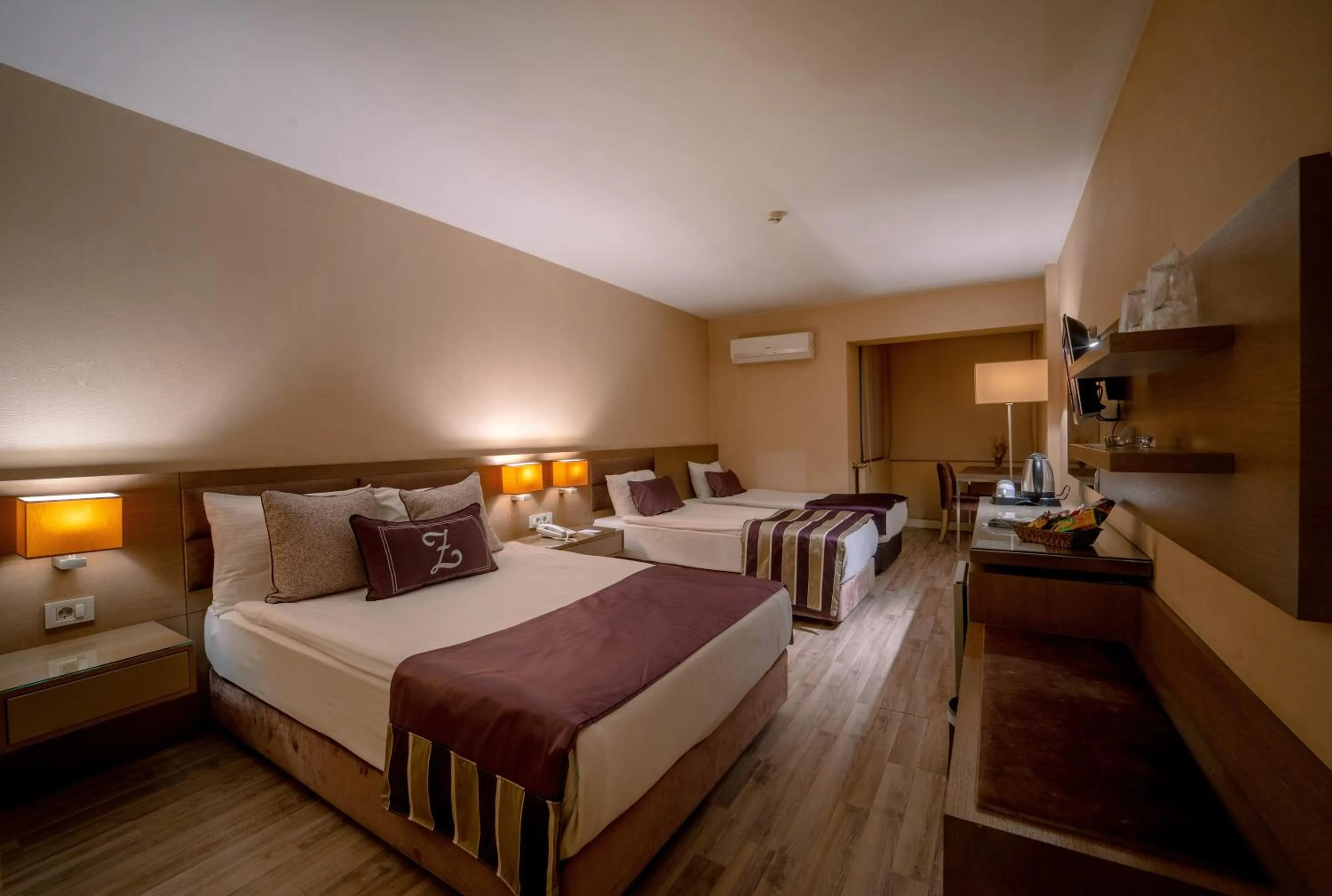 Bed in The New Hotel Zeybek