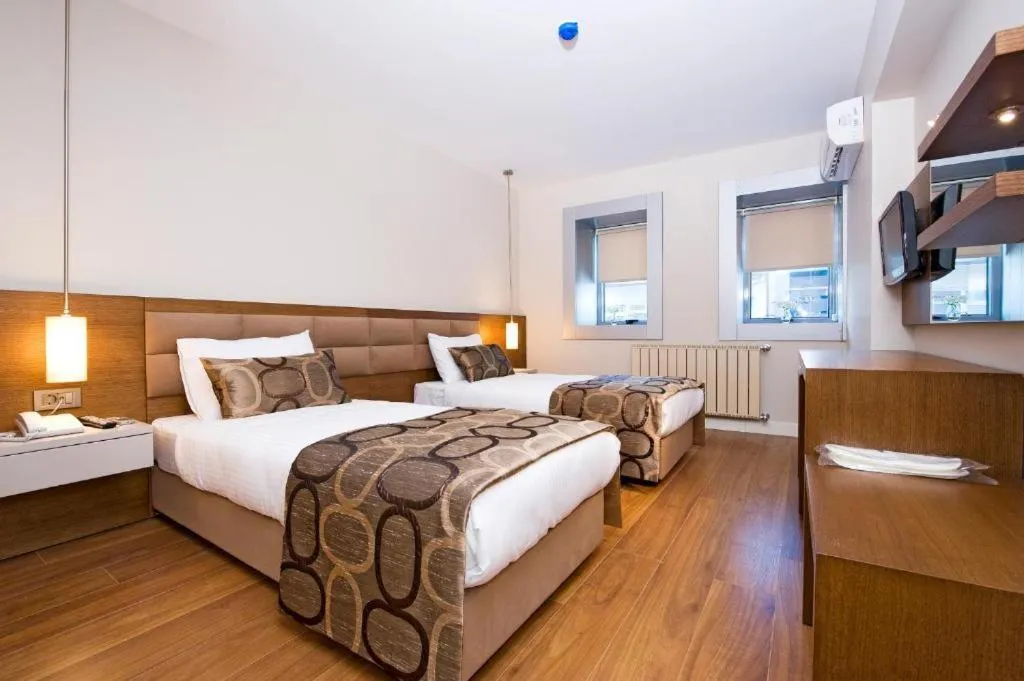 Bed in The New Hotel Zeybek