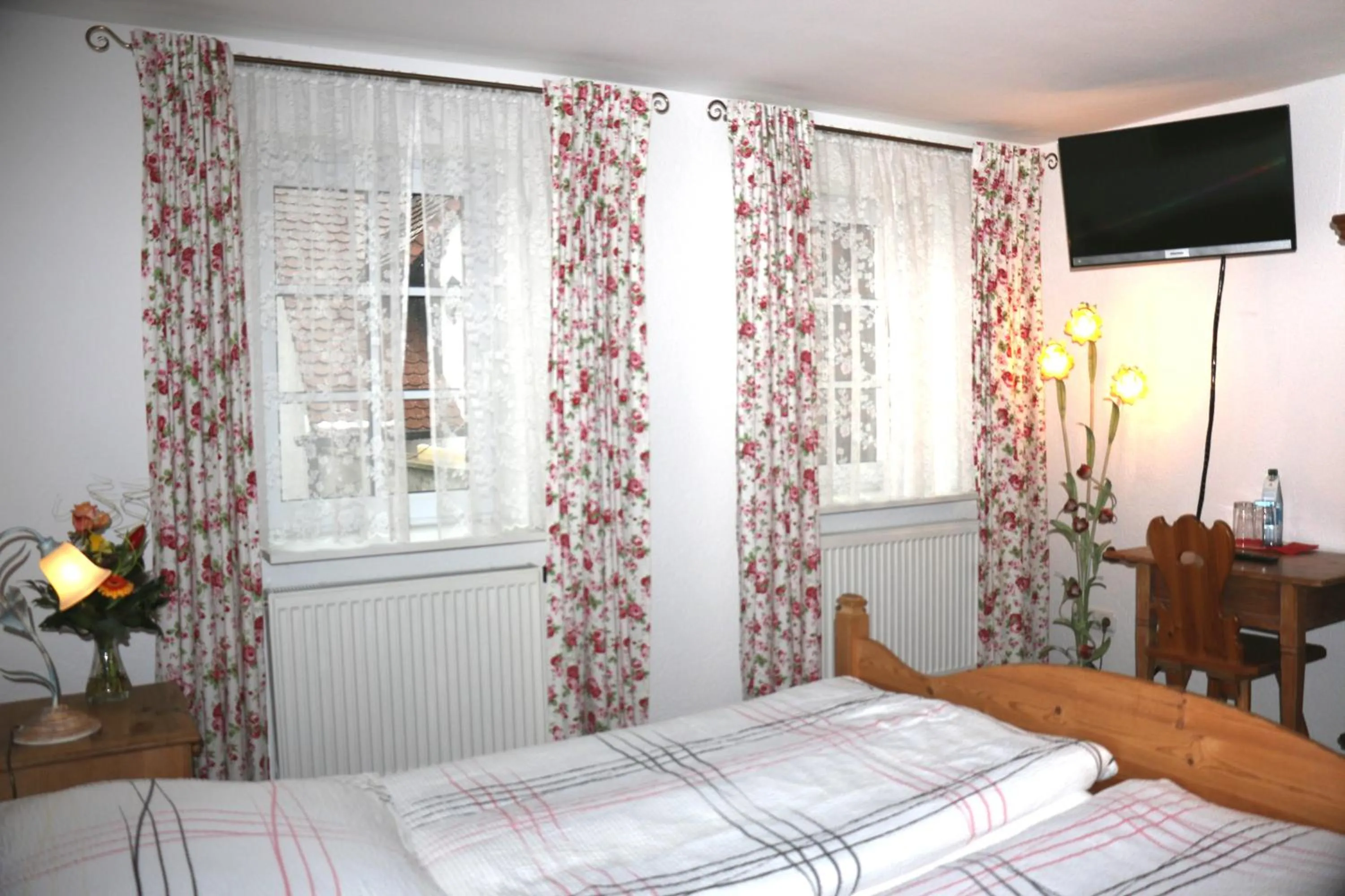 Bed in Landhotel Rangau Gasthof & Brennerei