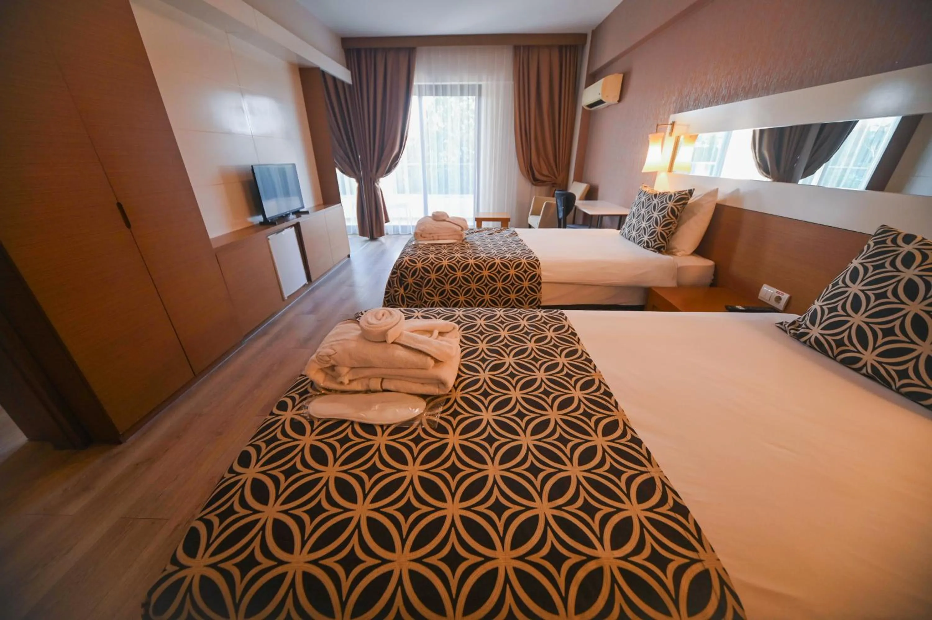 Bed in Tripolis Hotel