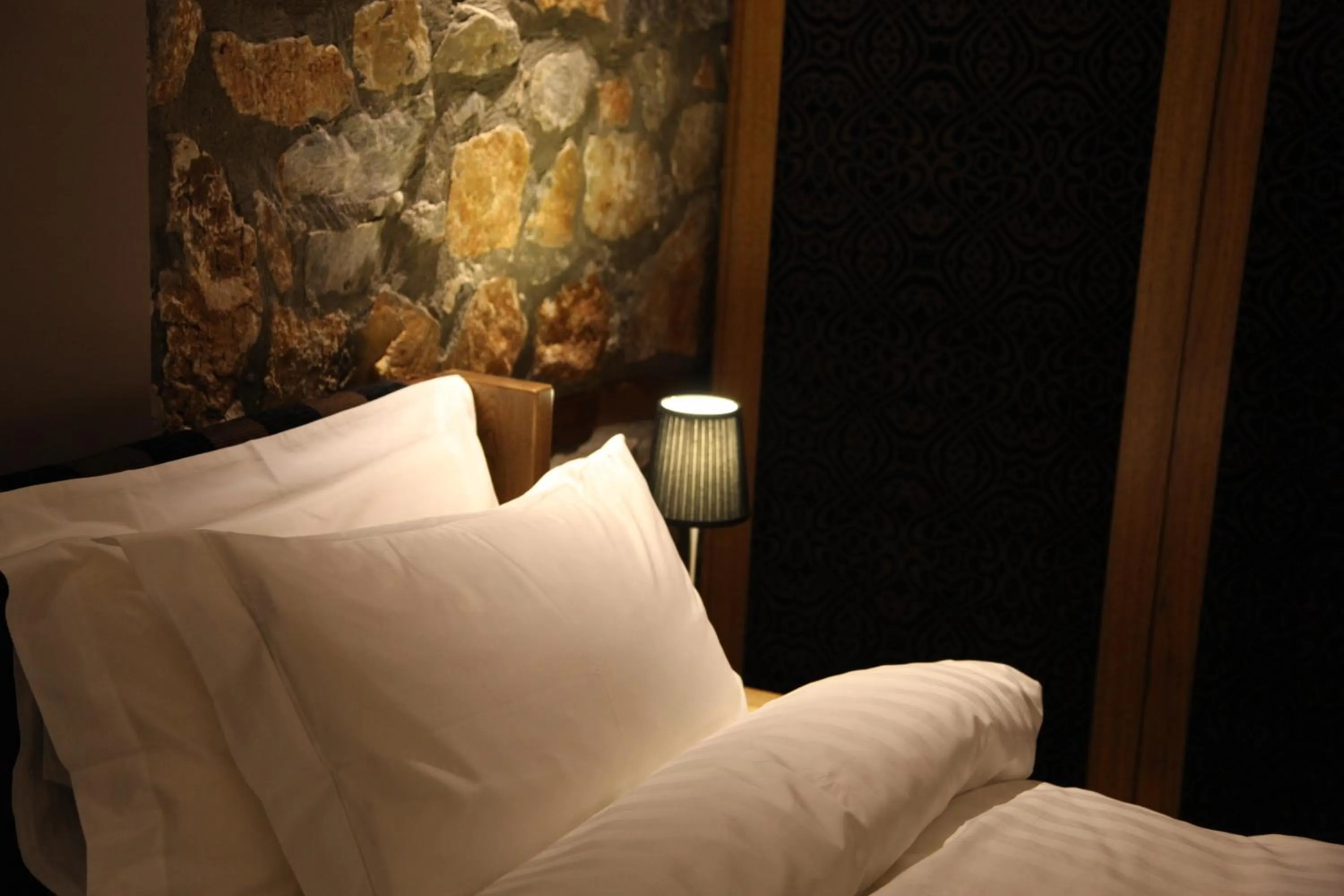 Bed in Miramonte Chalet Hotel Spa