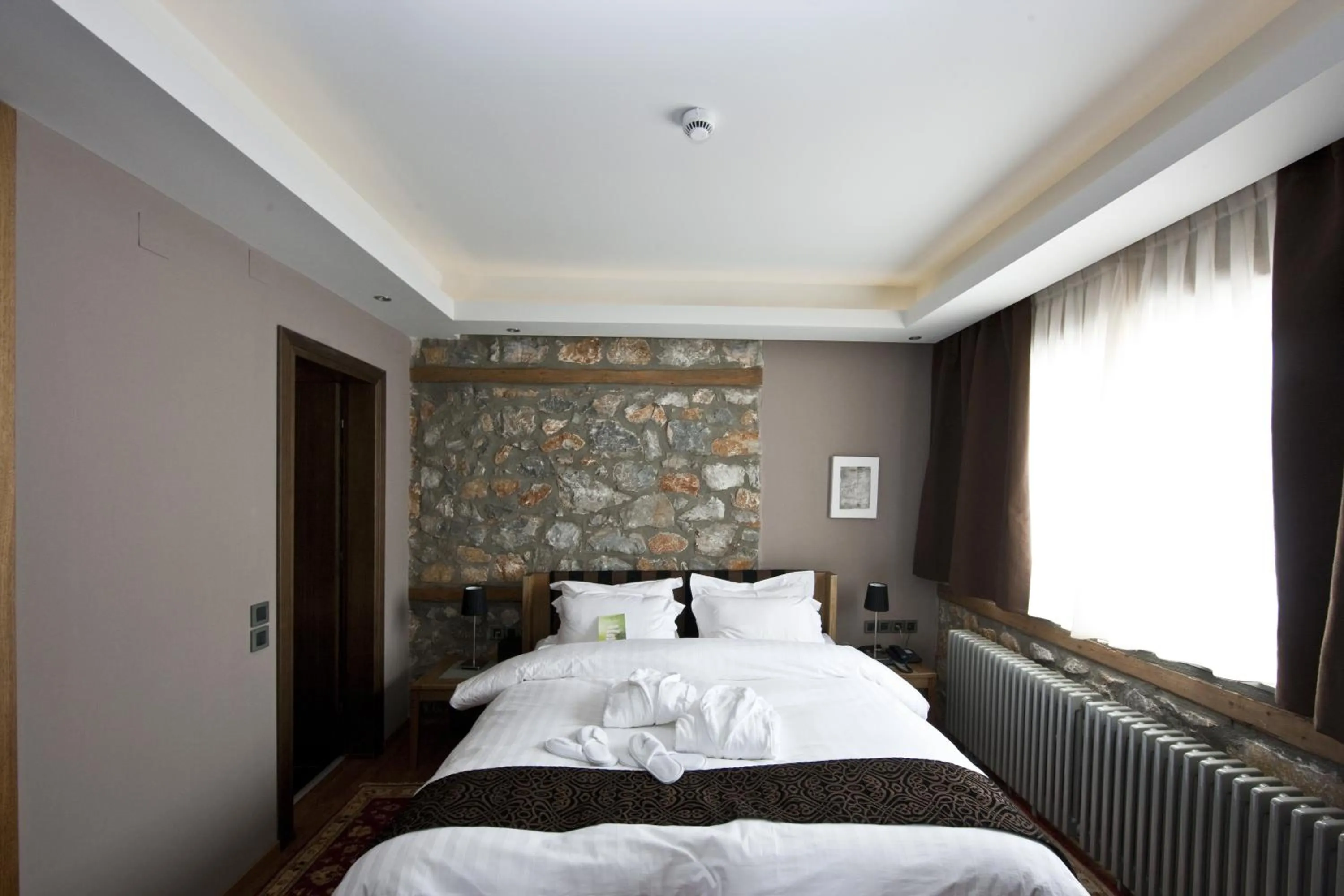 Bed in Miramonte Chalet Hotel Spa