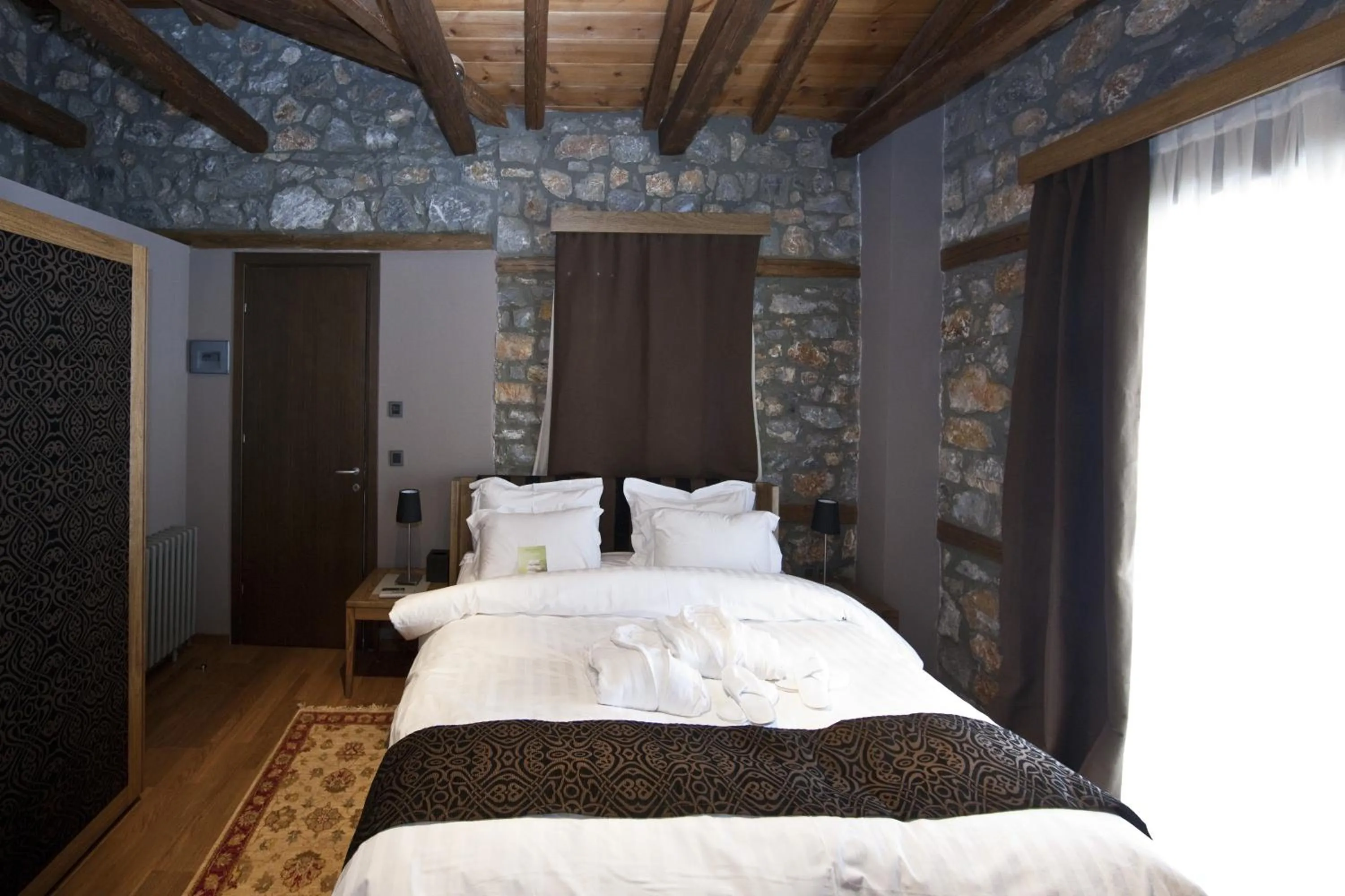 Bed in Miramonte Chalet Hotel Spa