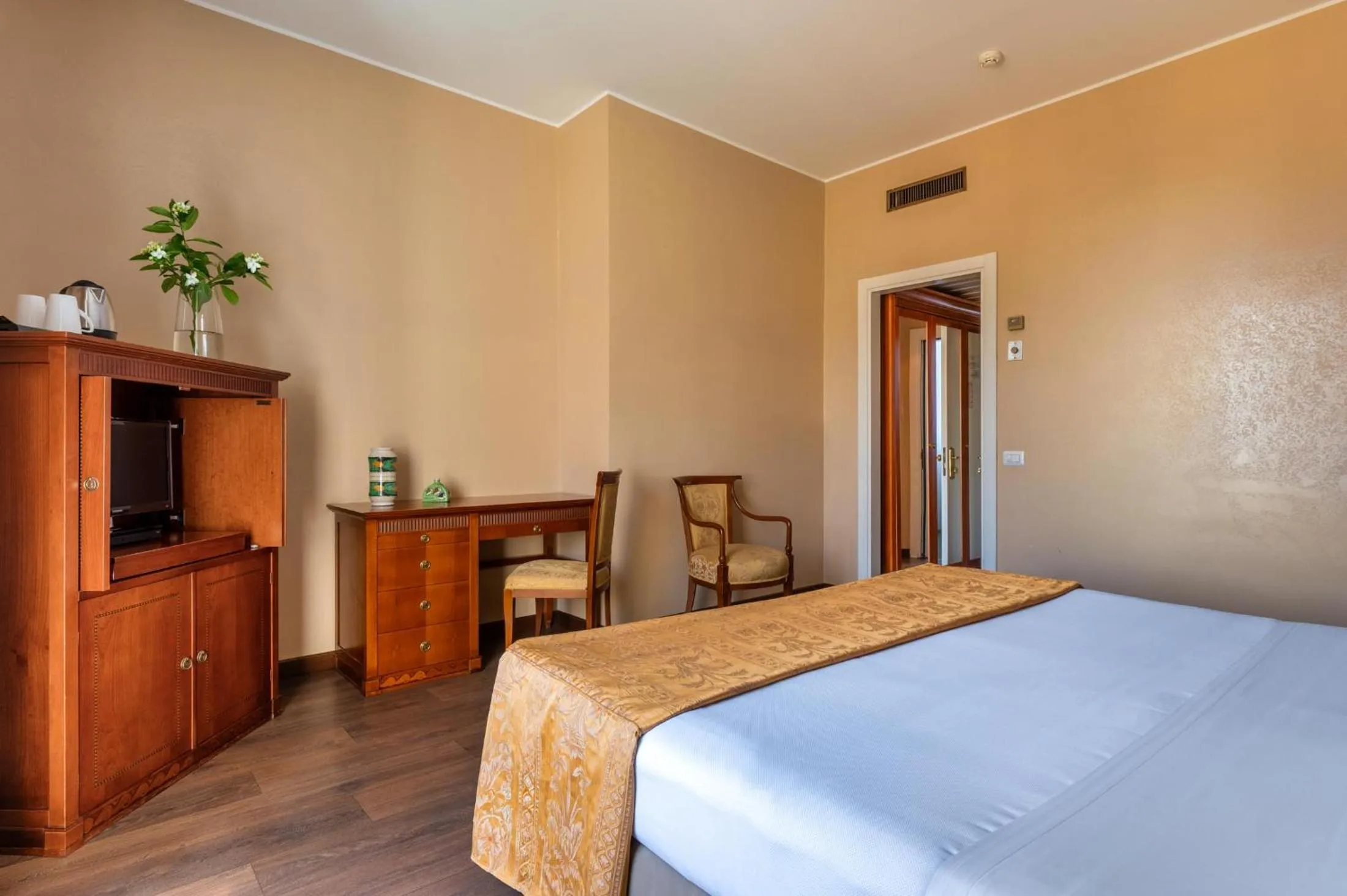 Bed in Excelsior Palace Hotel