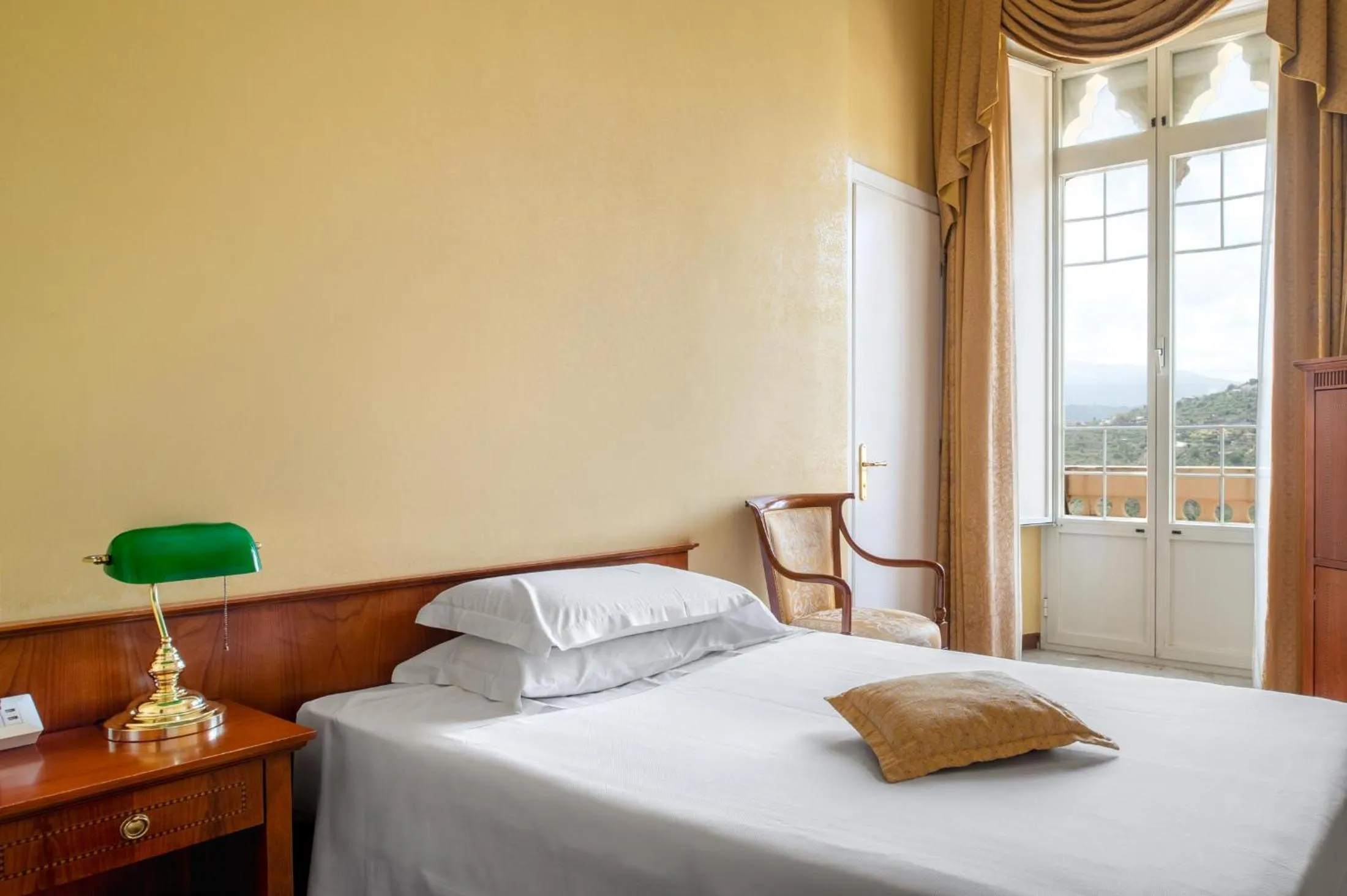 Bed in Excelsior Palace Hotel