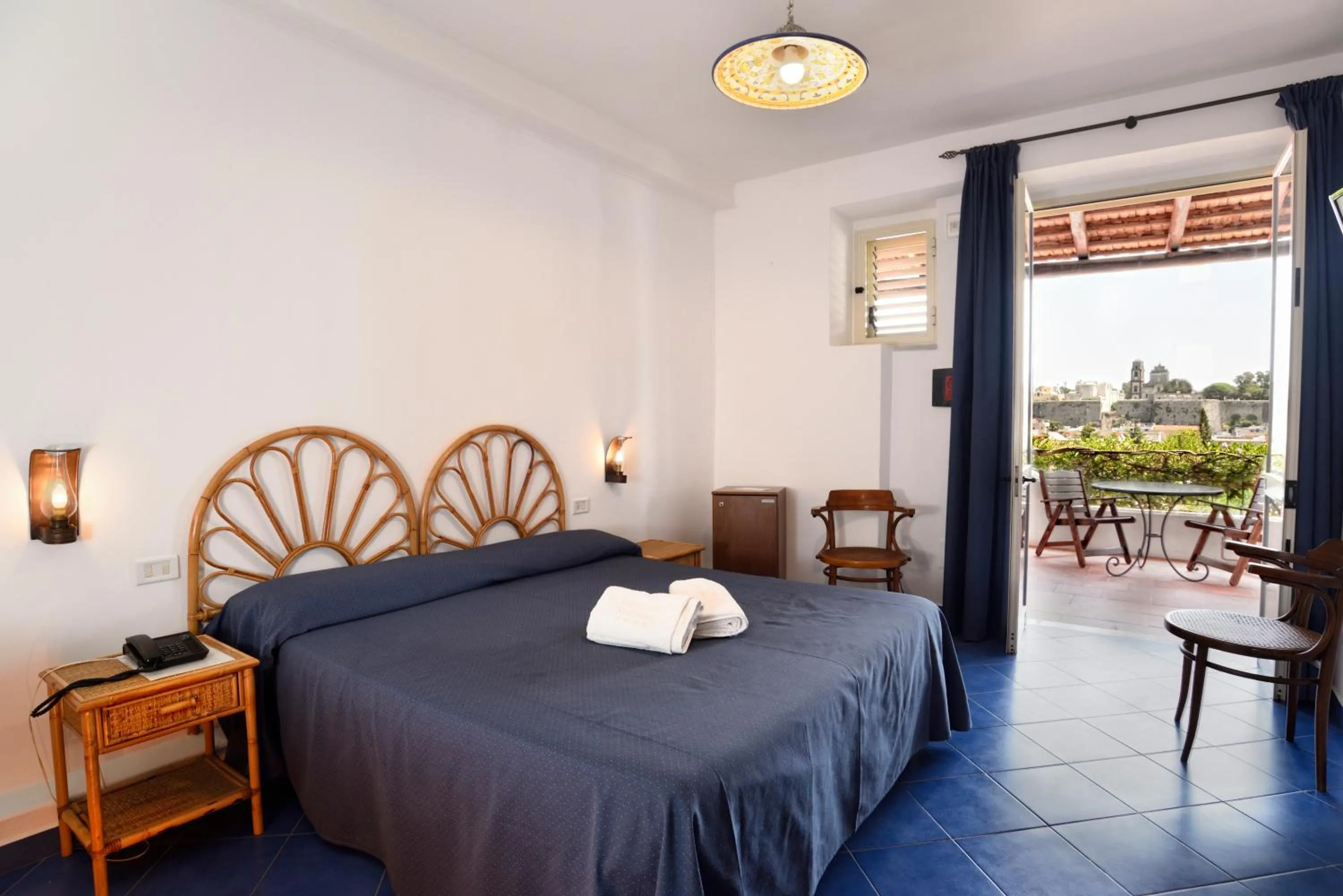 Bed in Gattopardo Park Hotel