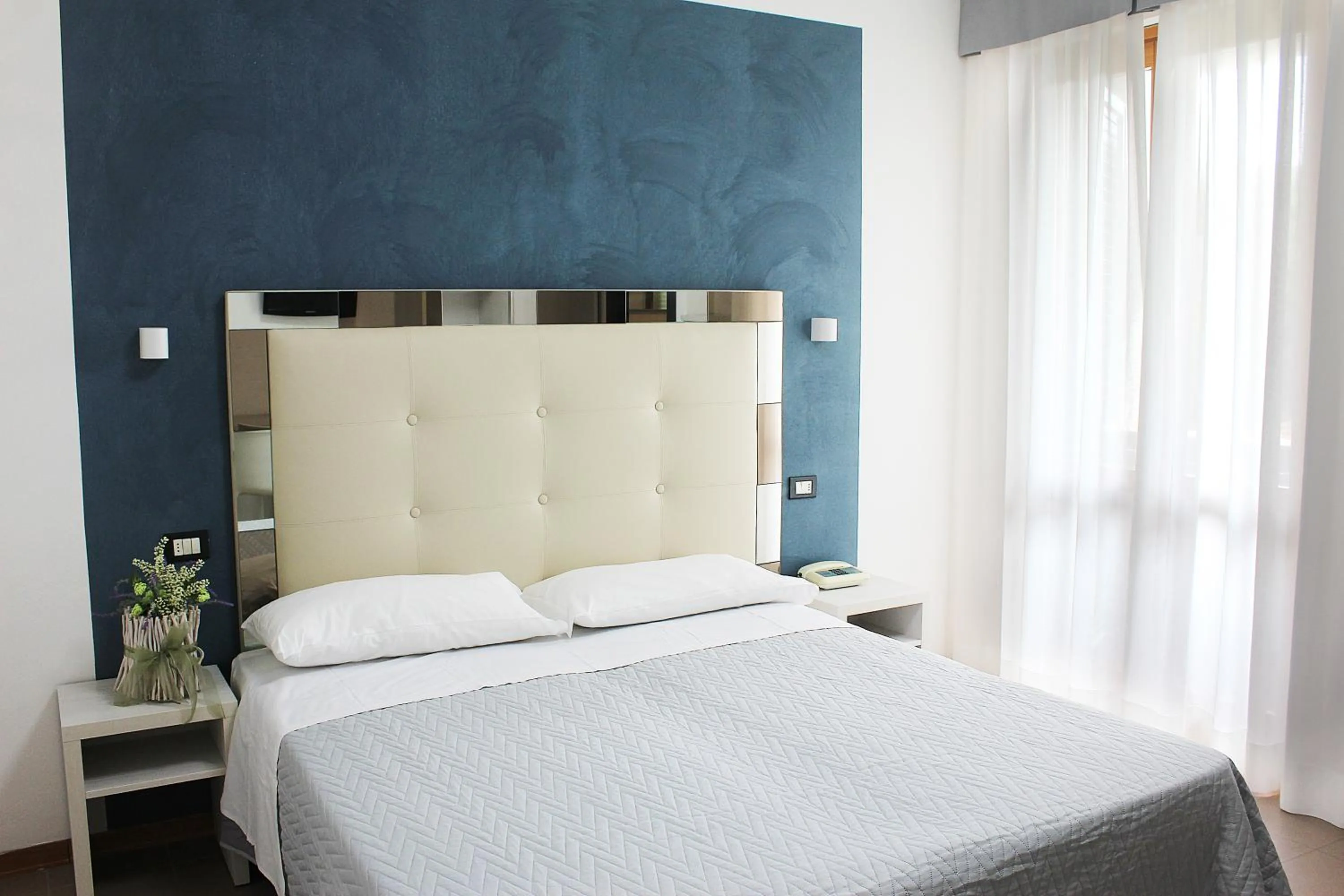 Bed in Hotel Brigantino