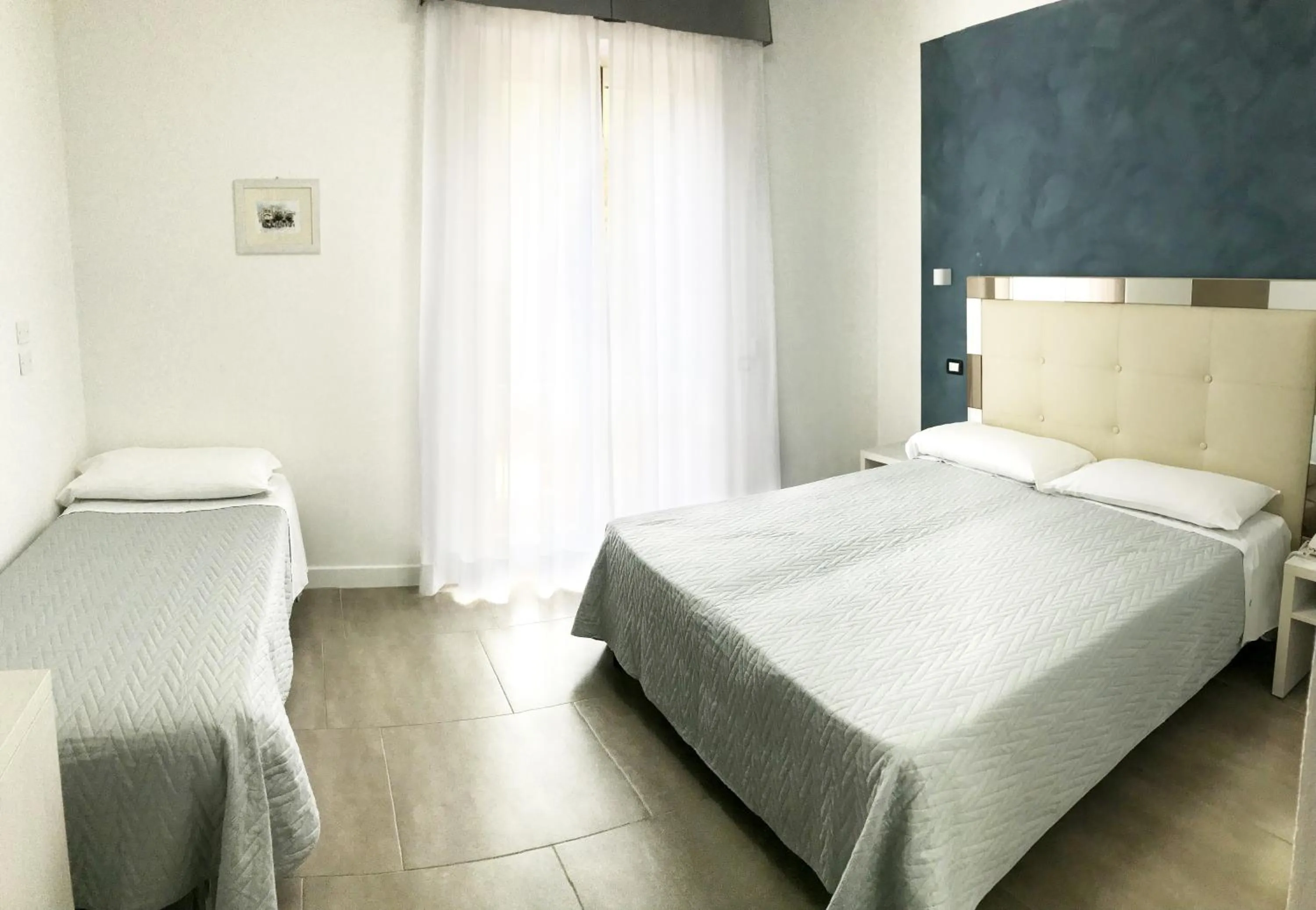 Bed in Hotel Brigantino