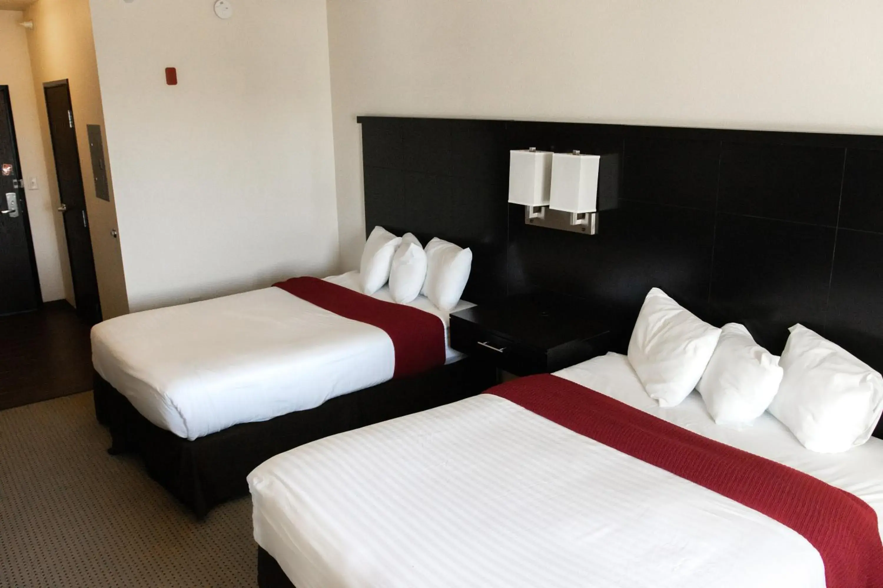 Deluxe Queen Room with Two Queen Beds in Black Gold Suites Stanley Deluxe Queen Room with Two Queen Beds in Black Gold Suites Stanley