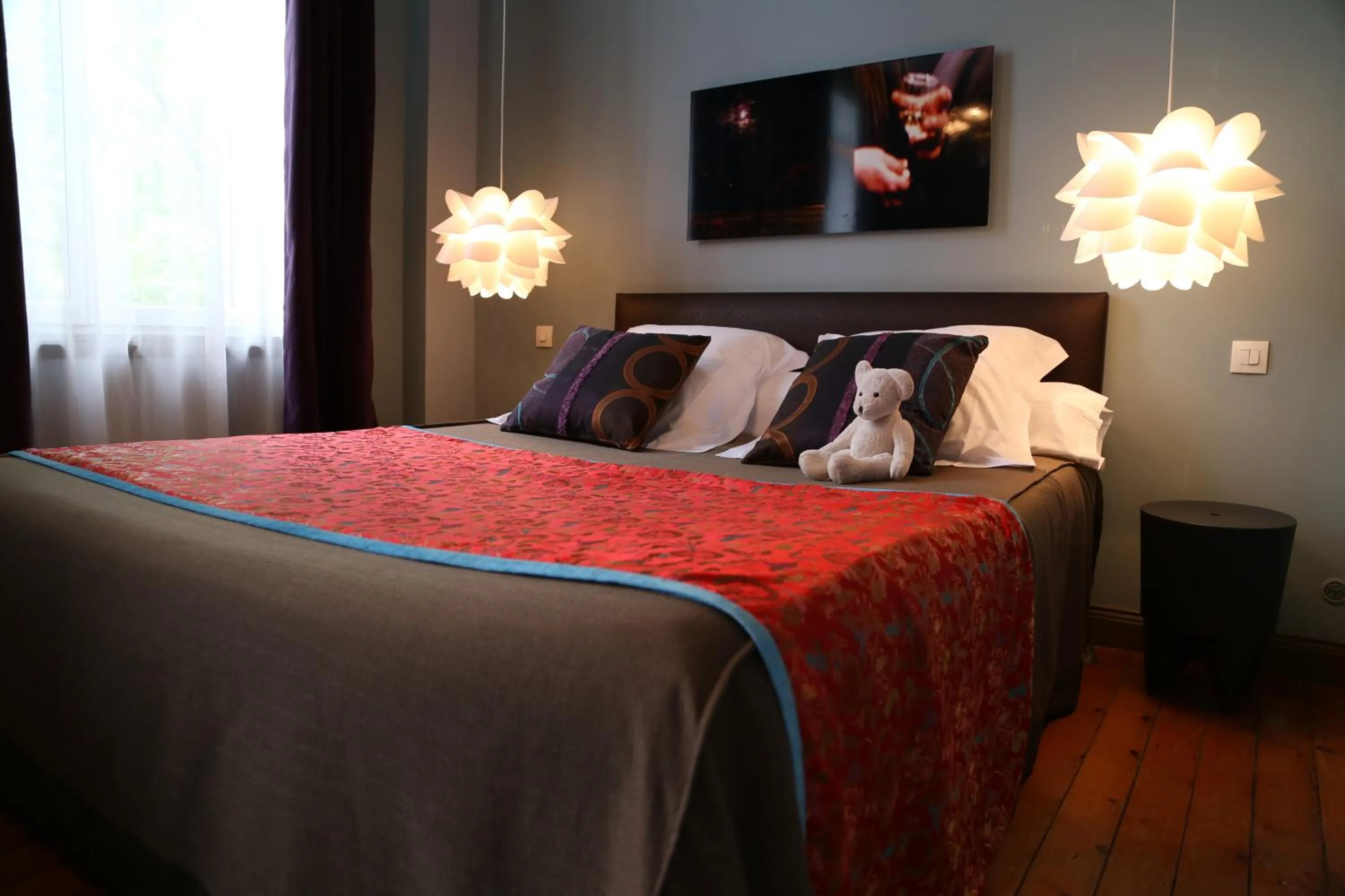 Photo of the whole room, Bed in Le Grand Duc