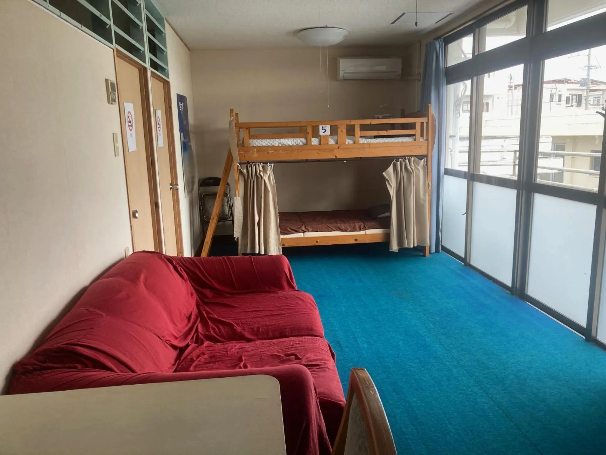 Bed in BIGJOY INN Hirokouji