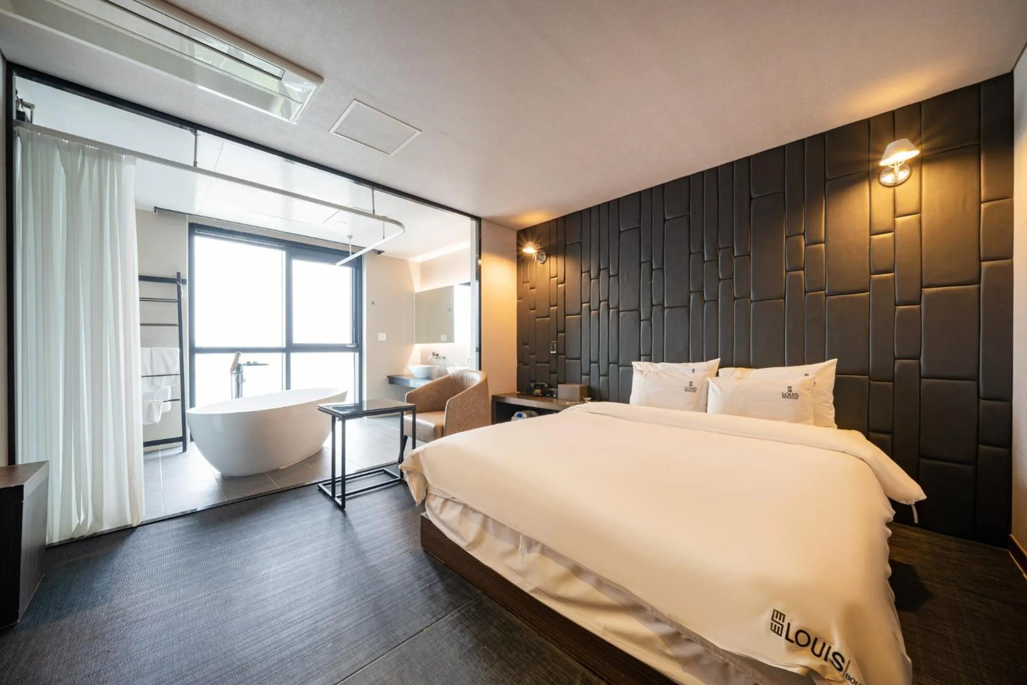 Bed in Louis Boutique Hotel