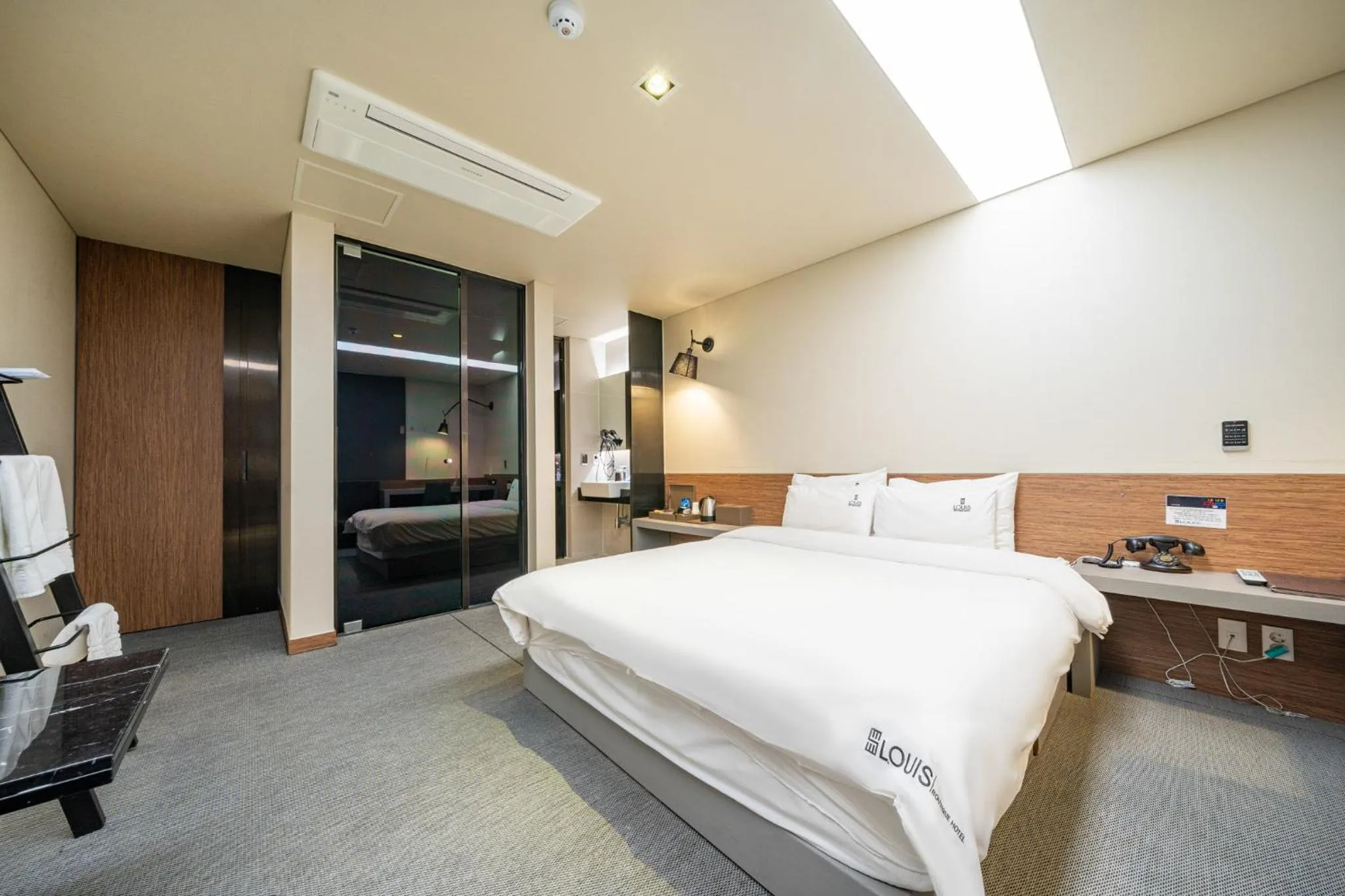 Bed in Louis Boutique Hotel