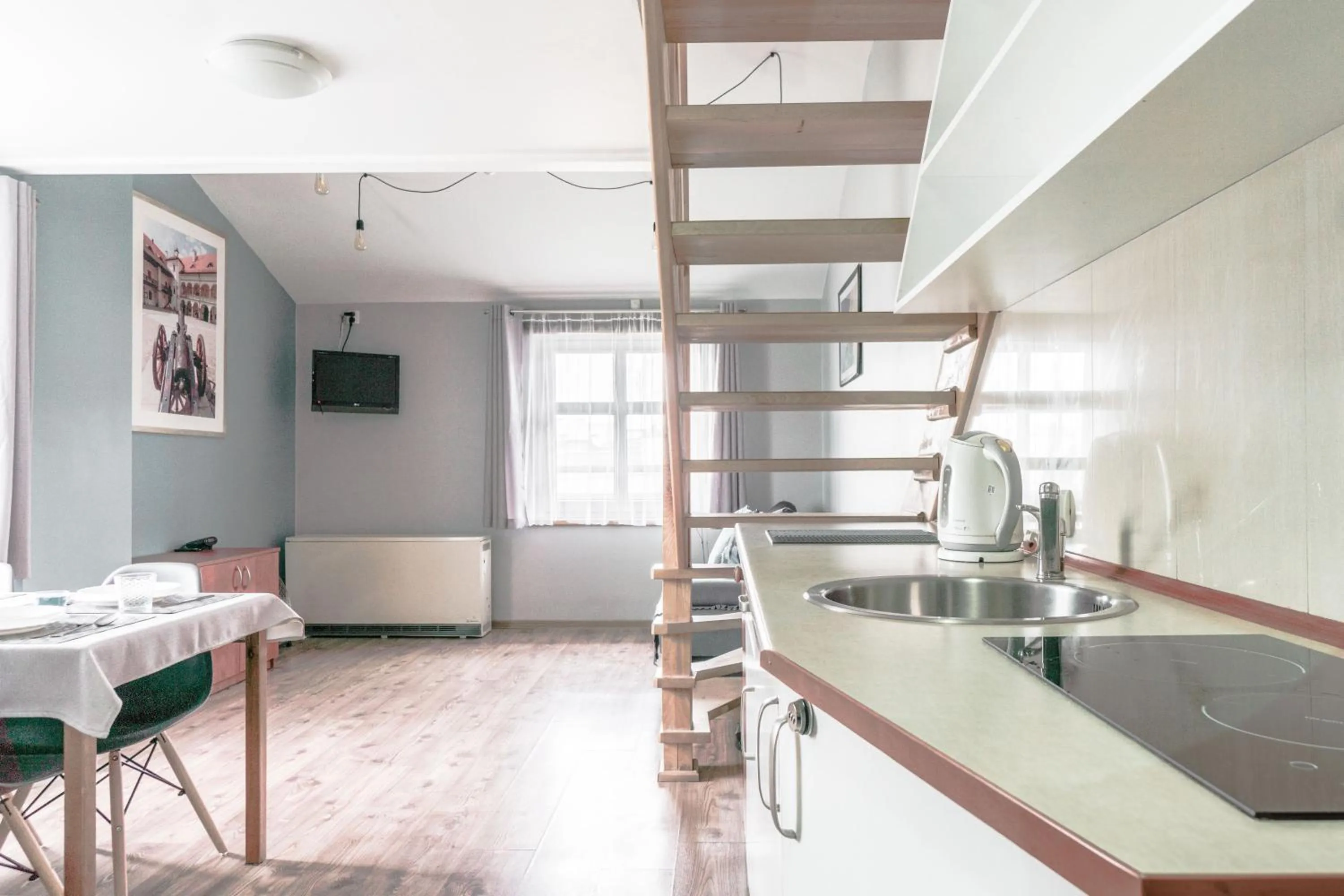 Kitchen or kitchenette in Apartamenty Amber