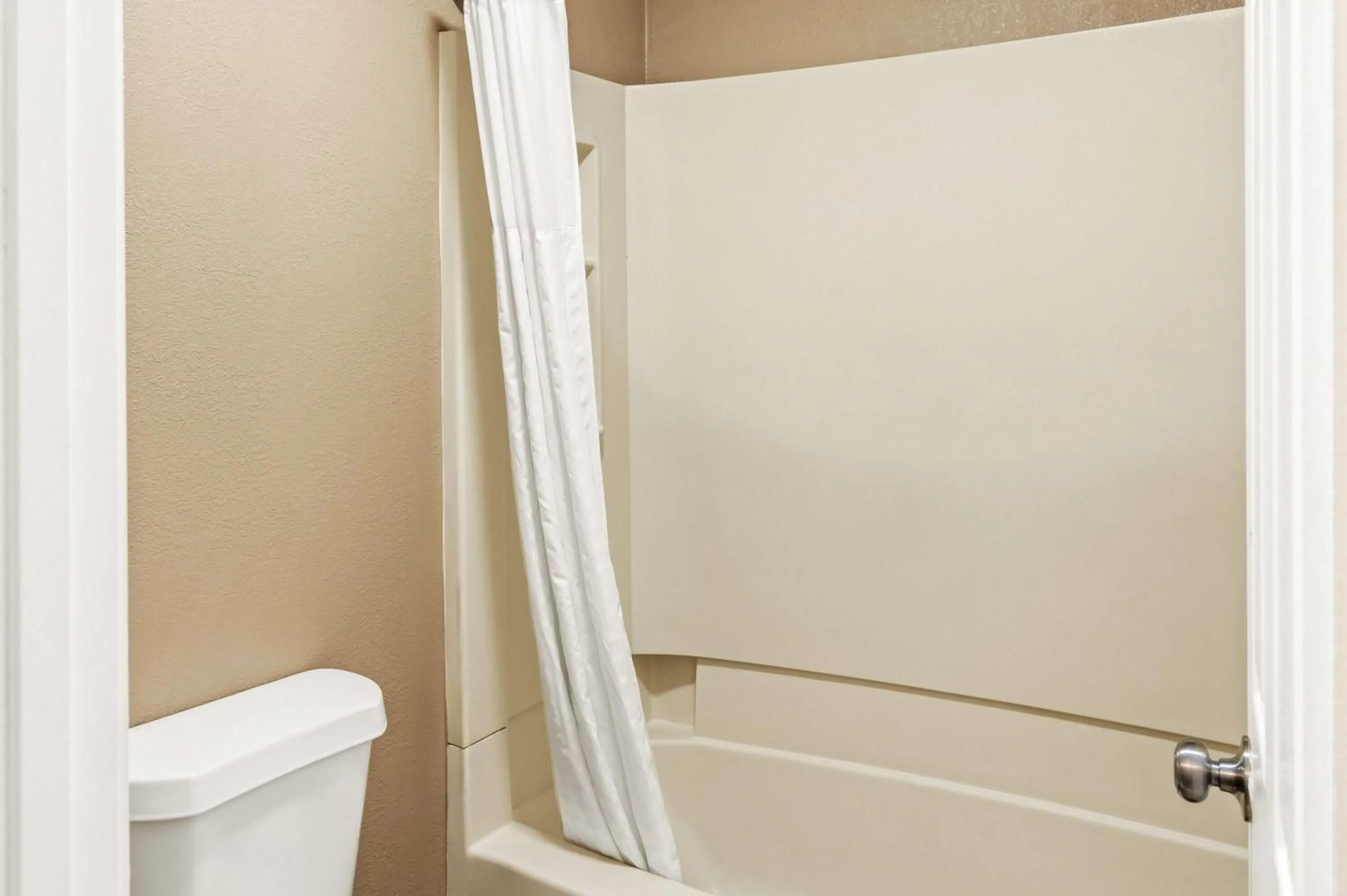 Bathroom in Super 8 by Wyndham Cincinnati-Springdale OH