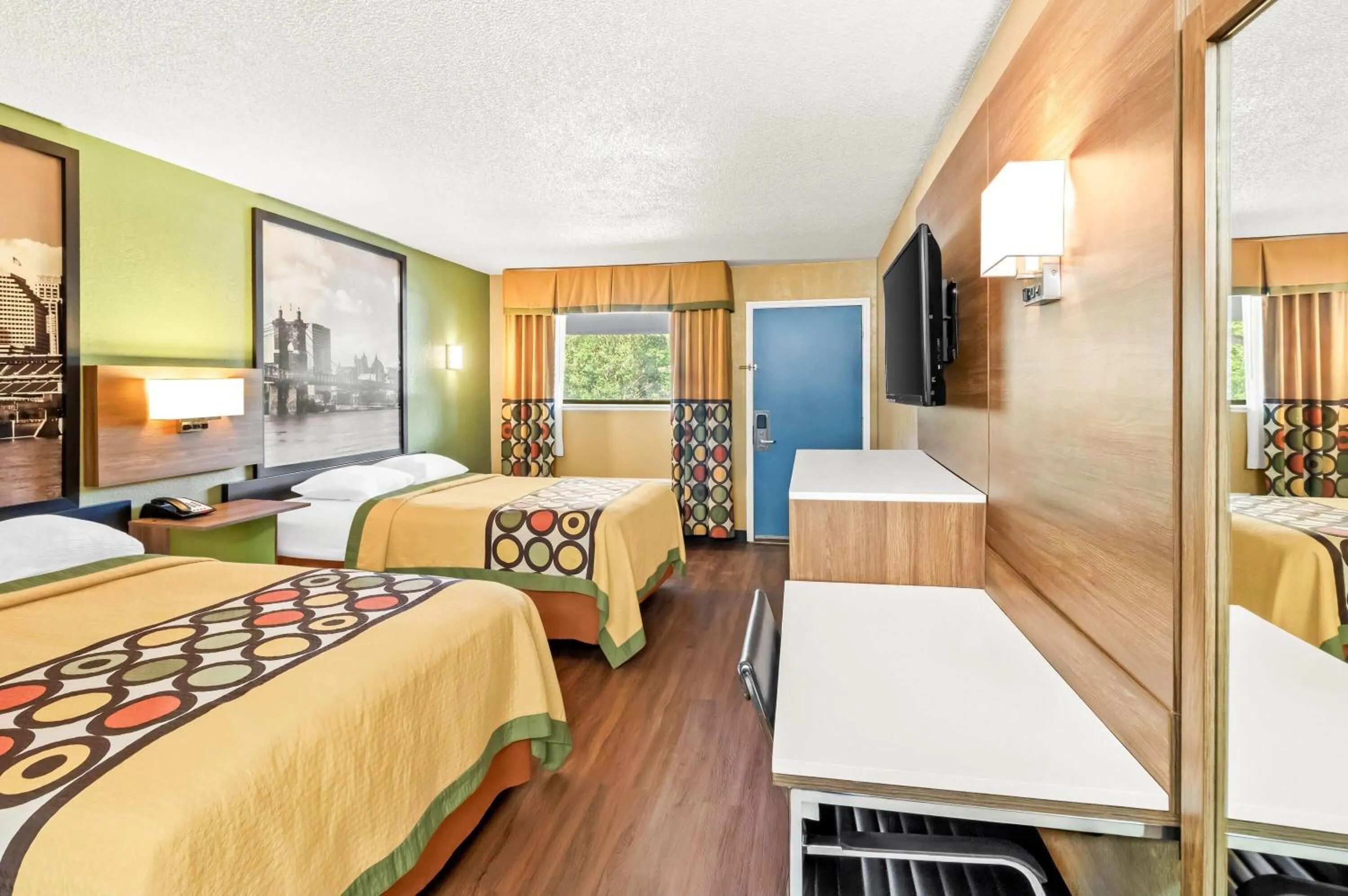 Bed in Super 8 by Wyndham Cincinnati-Springdale OH