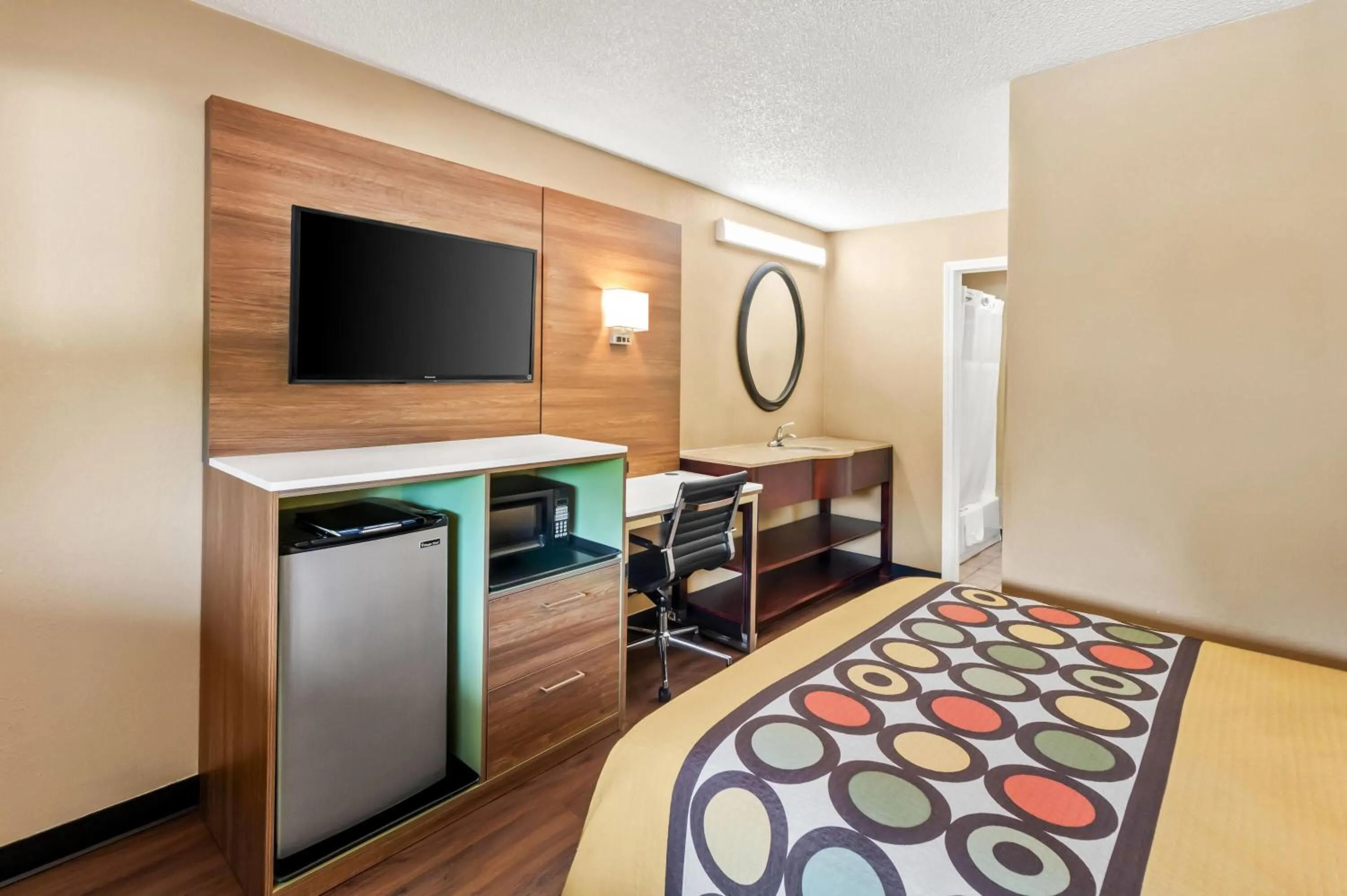 Bed in Super 8 by Wyndham Cincinnati-Springdale OH