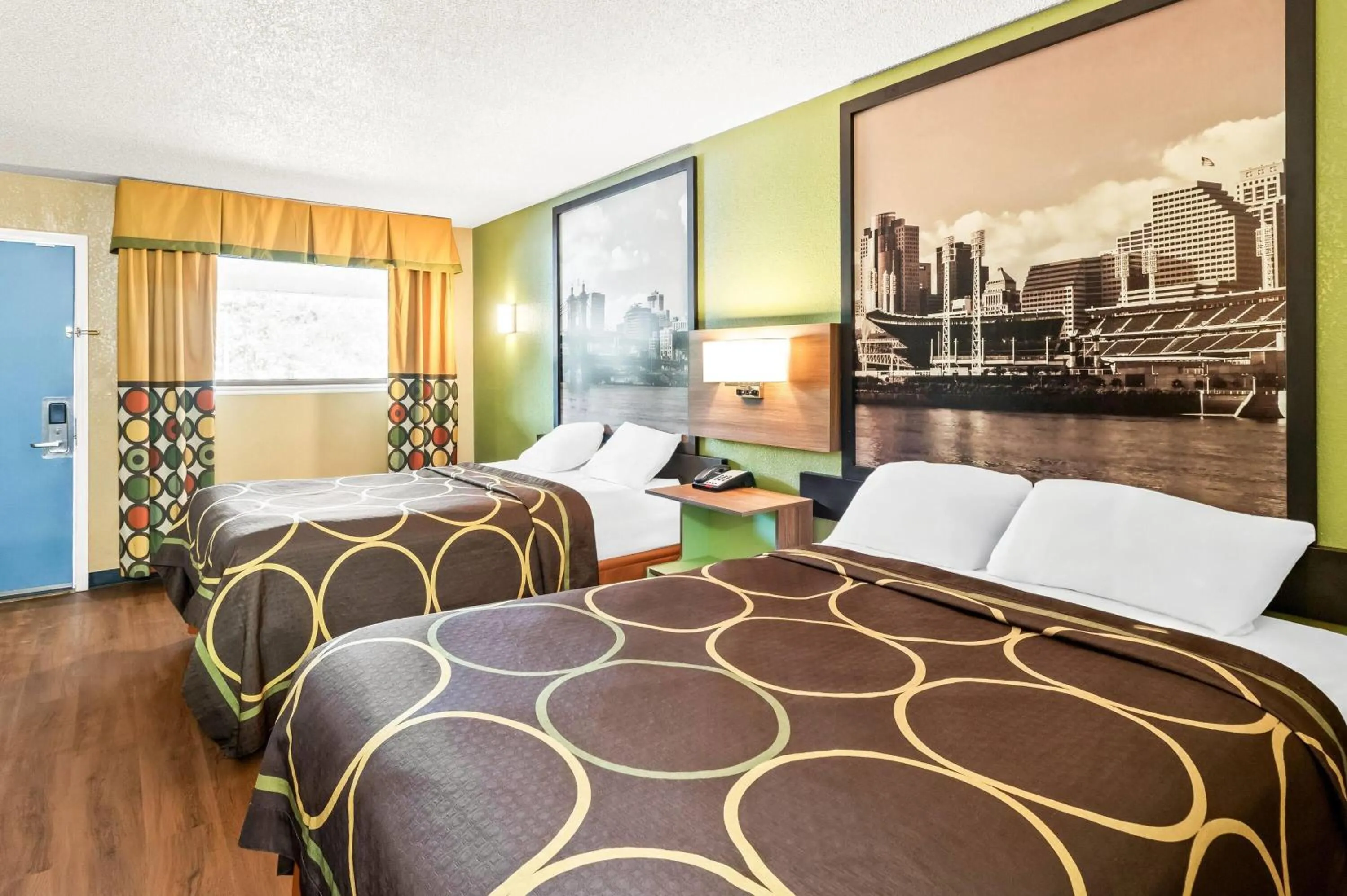 Bed in Super 8 by Wyndham Cincinnati-Springdale OH