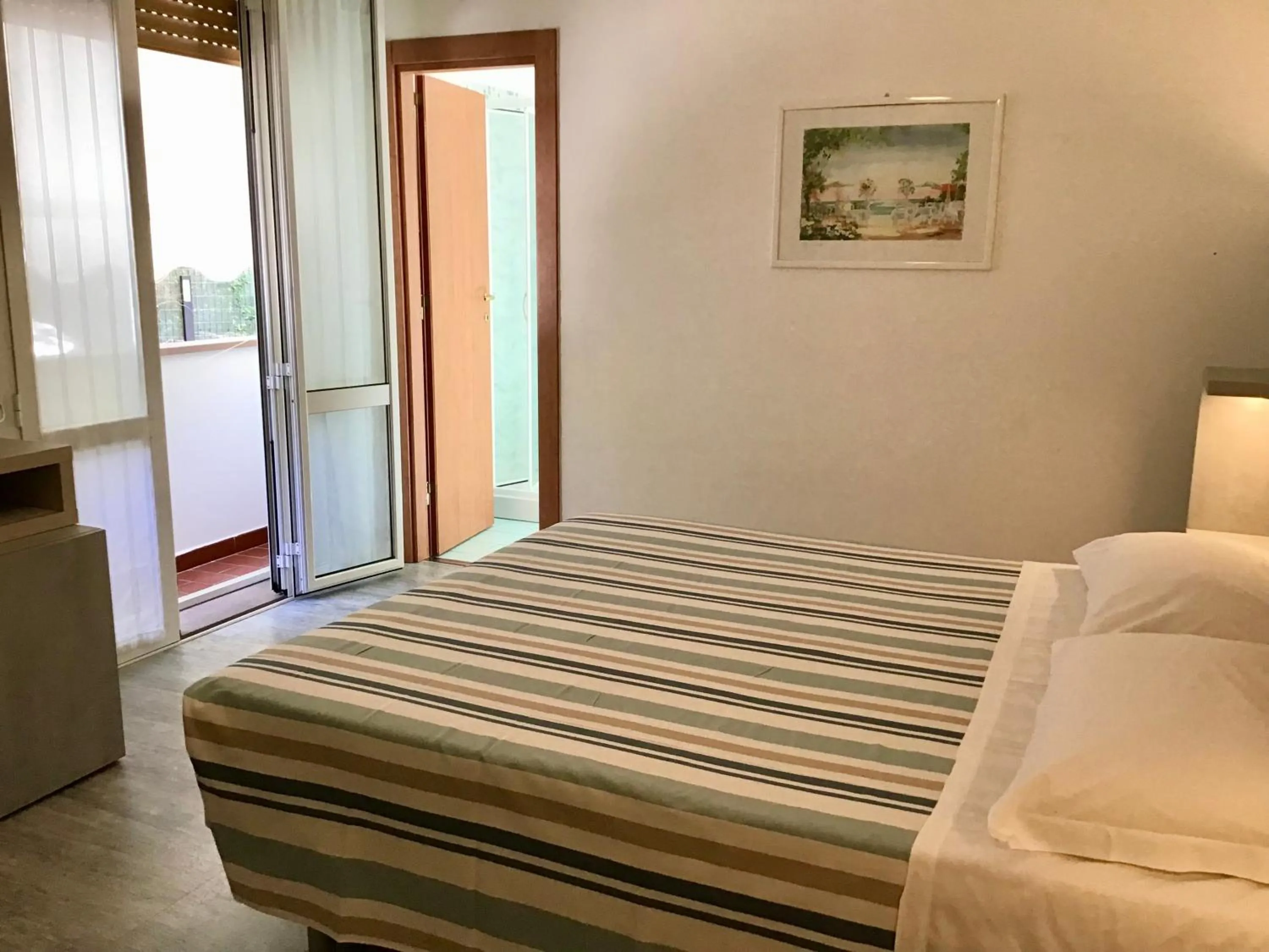 Photo of the whole room in La Coccinella Residence