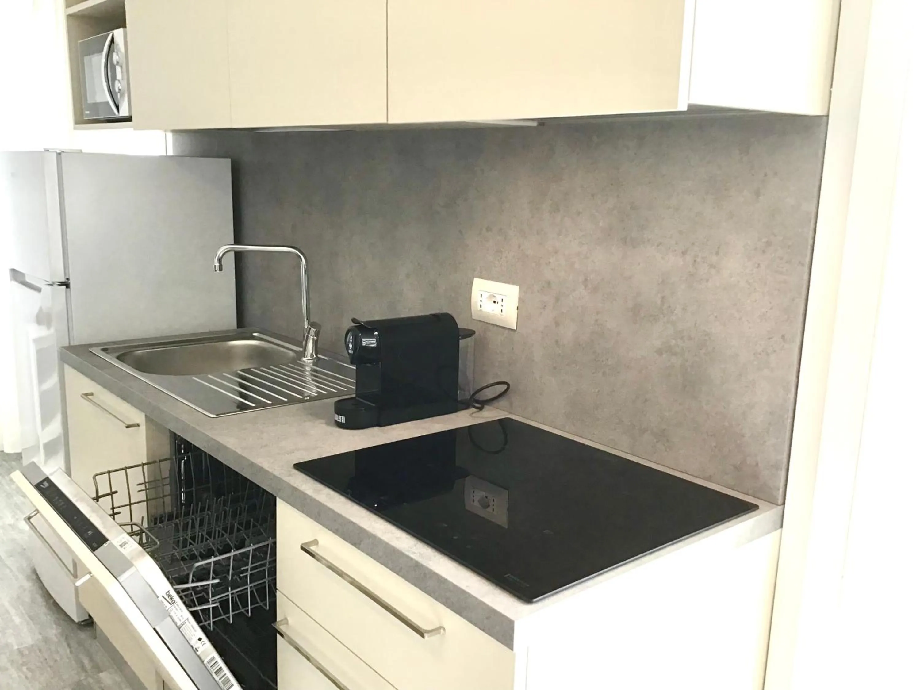 Kitchen or kitchenette in La Coccinella Residence