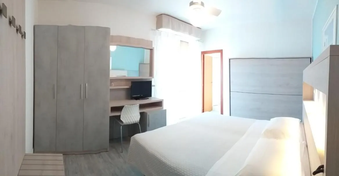 Photo of the whole room in La Coccinella Residence