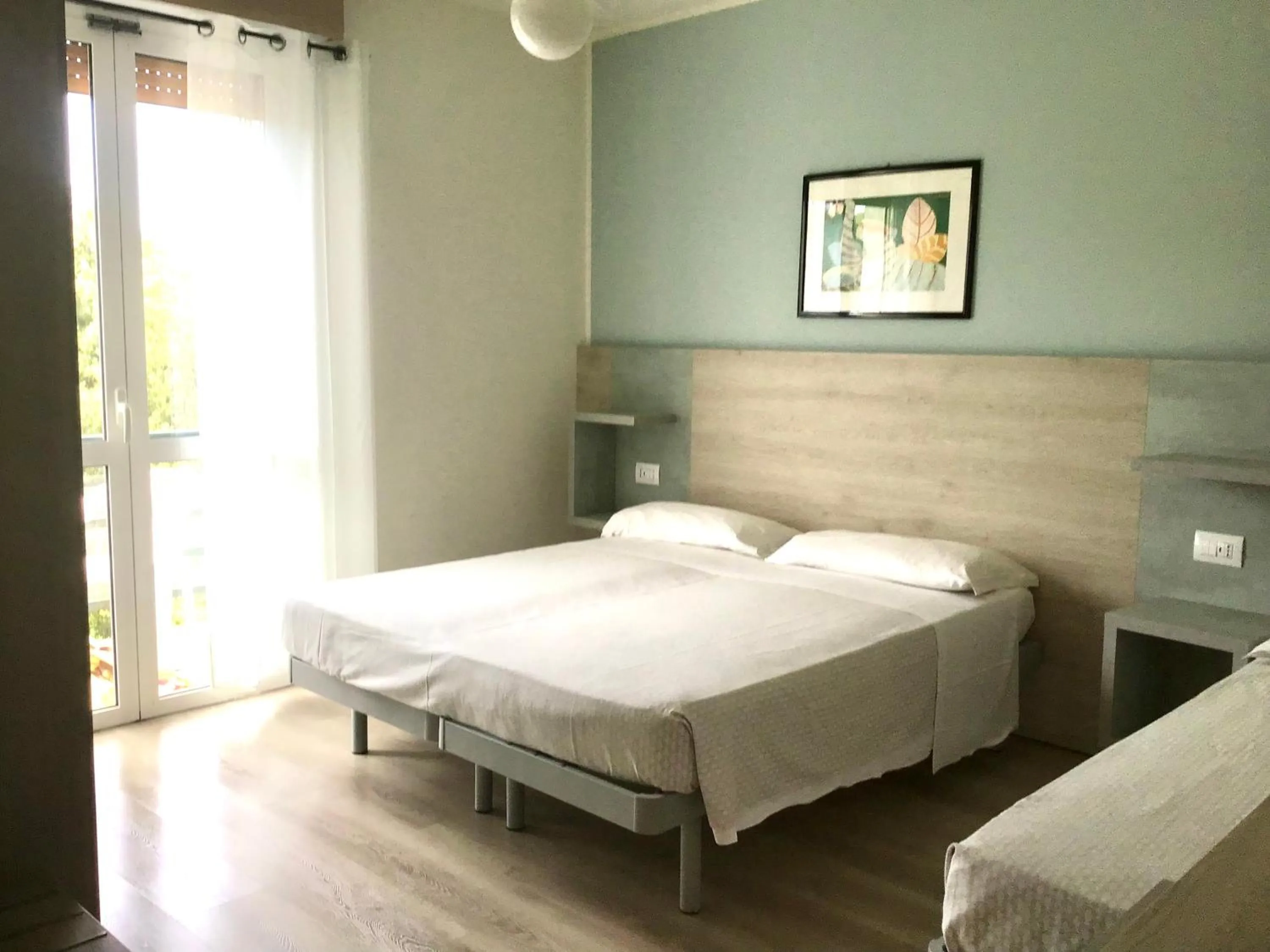 Photo of the whole room in La Coccinella Residence