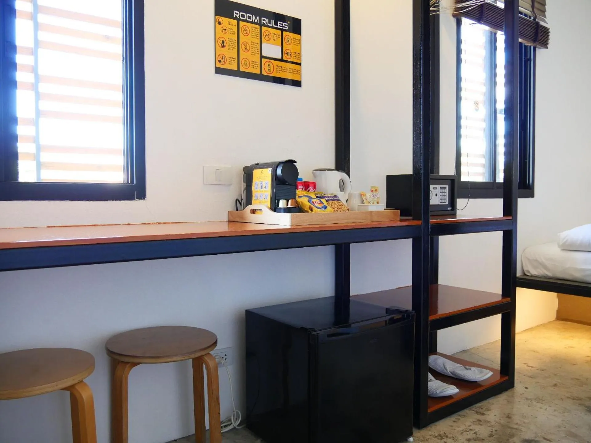 Seating area, Bed in Book a Bed Poshtel - SHA Plus