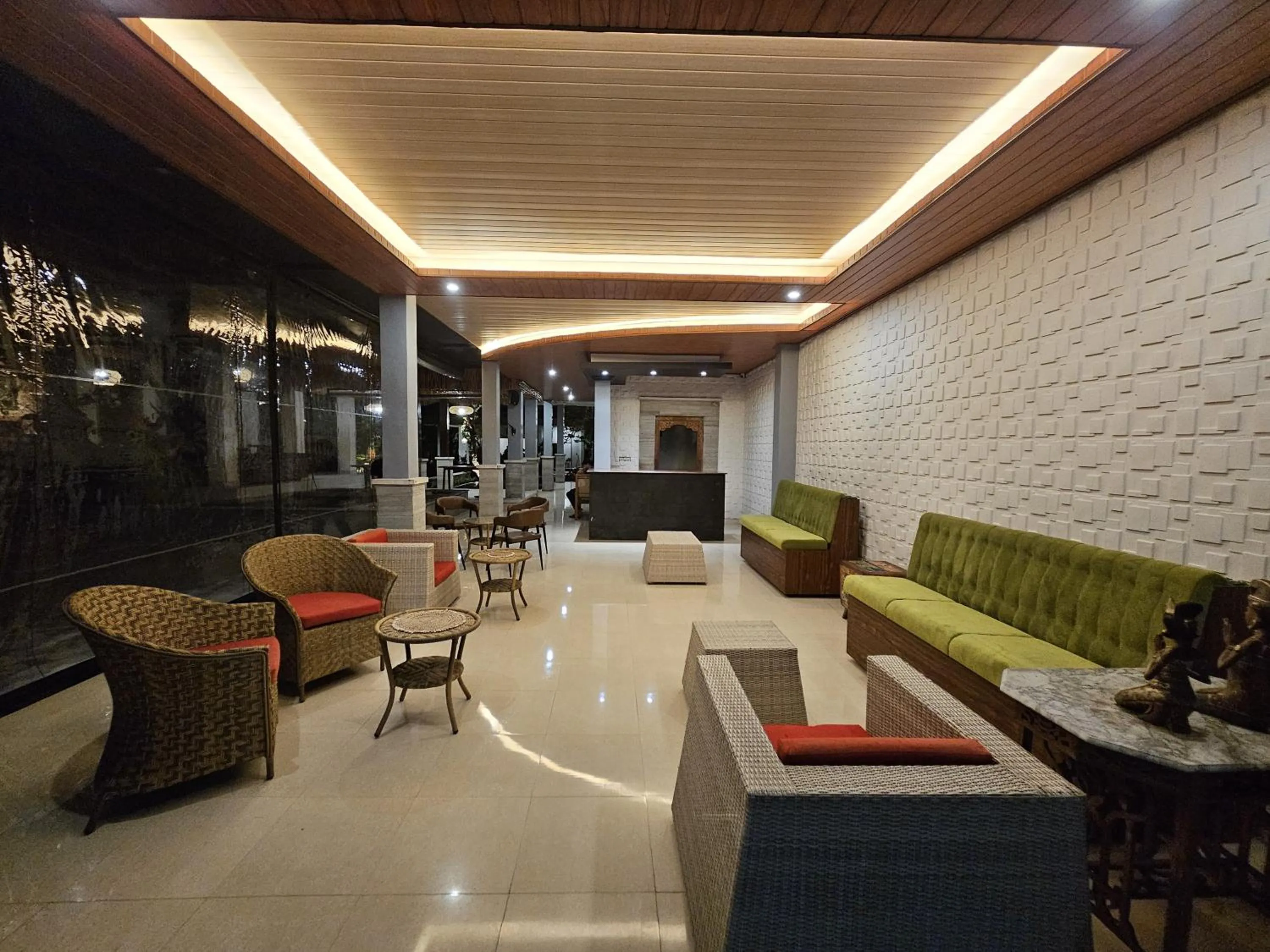 Lobby or reception in Putri Ayu Cottages