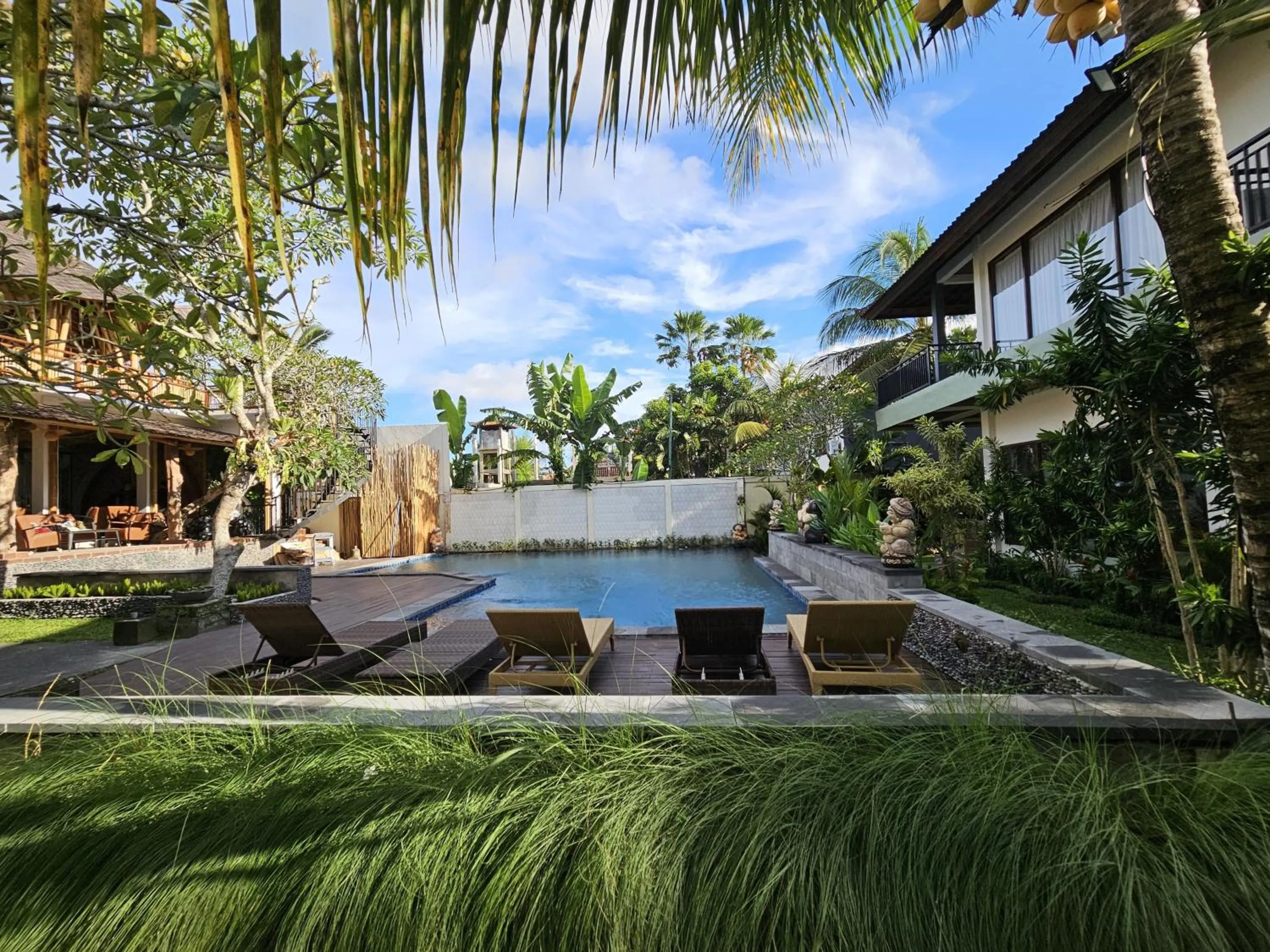 Swimming pool in Putri Ayu Cottages