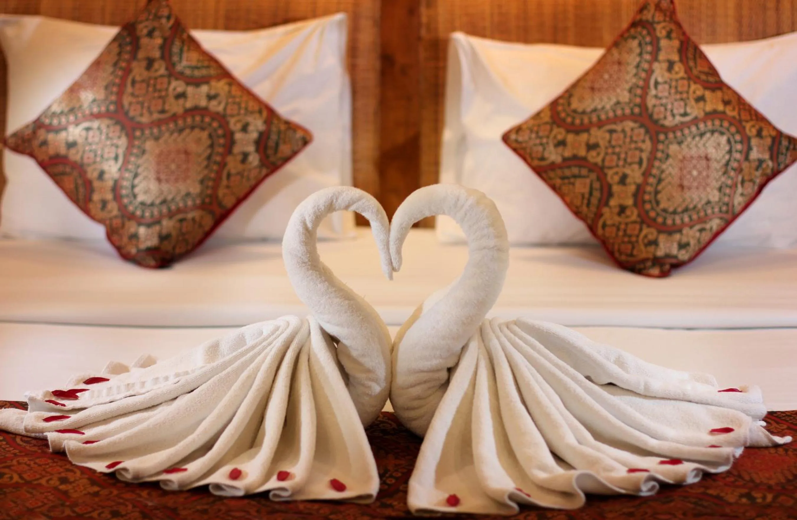 towels, Bed in Putri Ayu Cottages