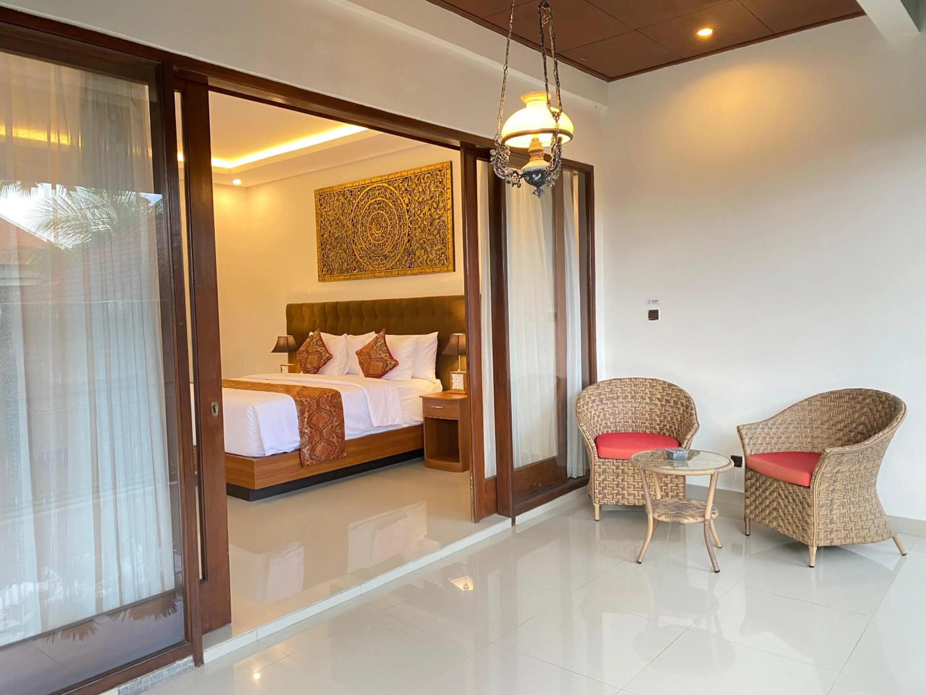 Balcony/Terrace, Bed in Putri Ayu Cottages