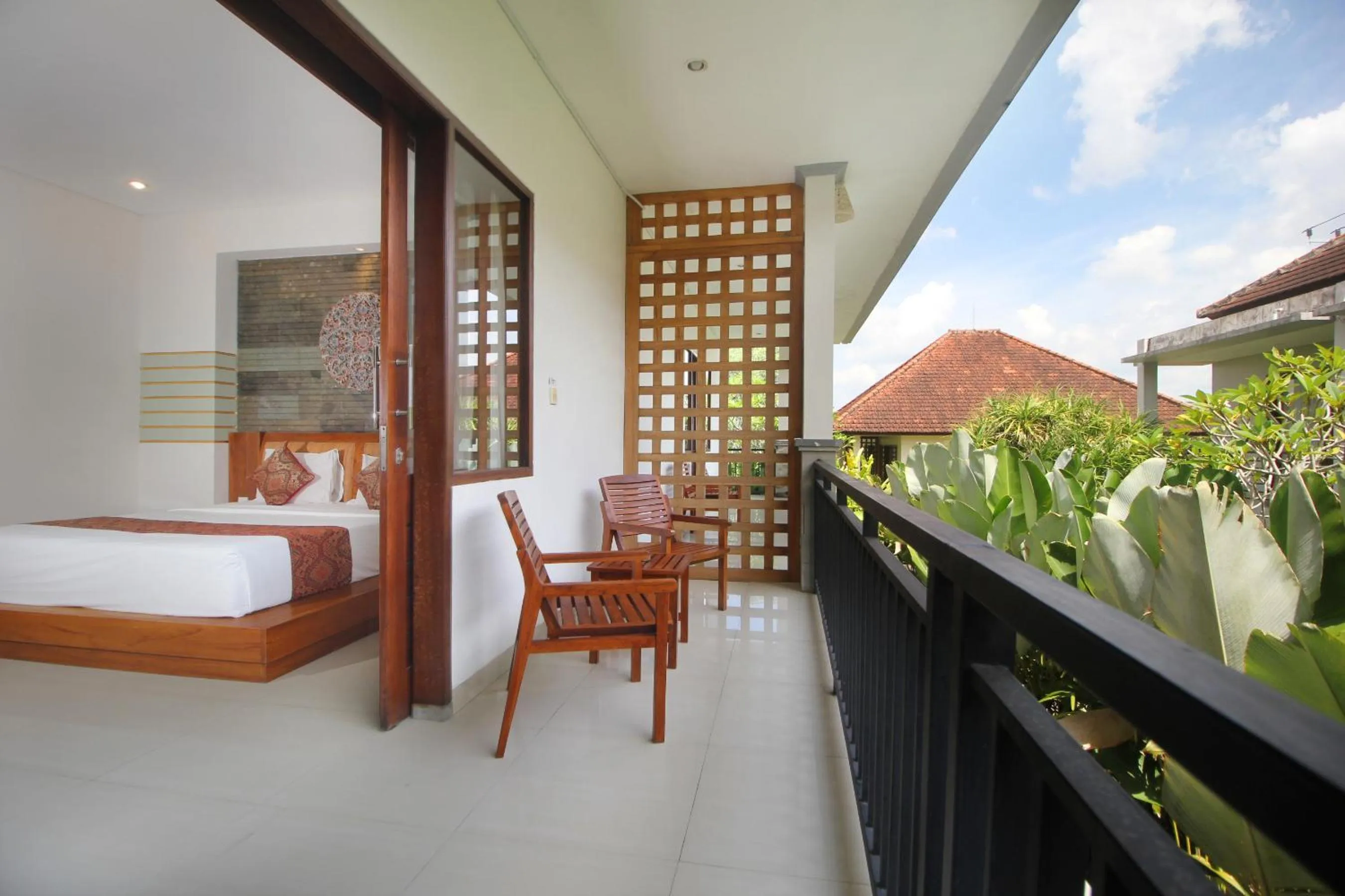 Balcony/Terrace, Bed in Putri Ayu Cottages