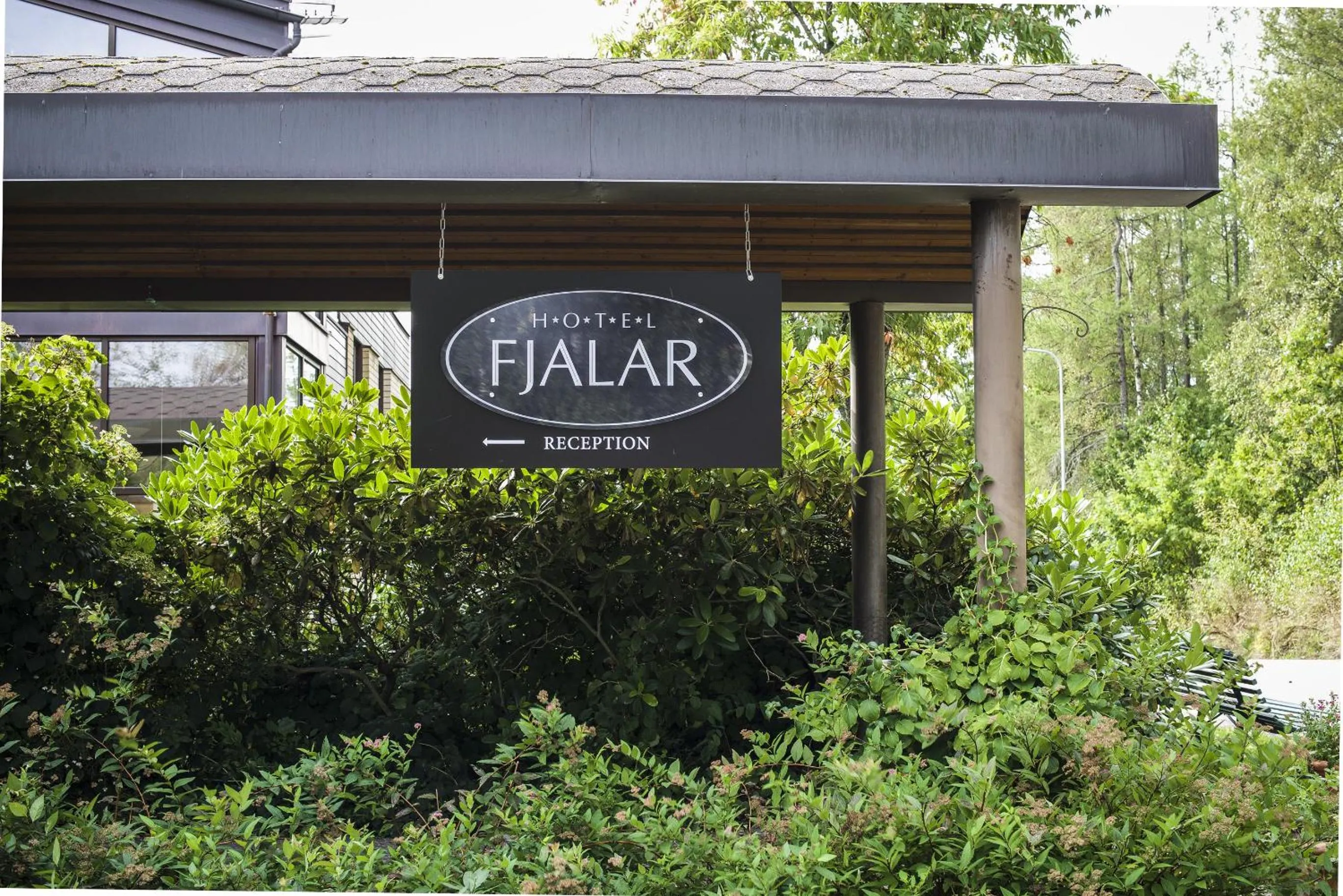 Property logo or sign in Hotel Fjalar