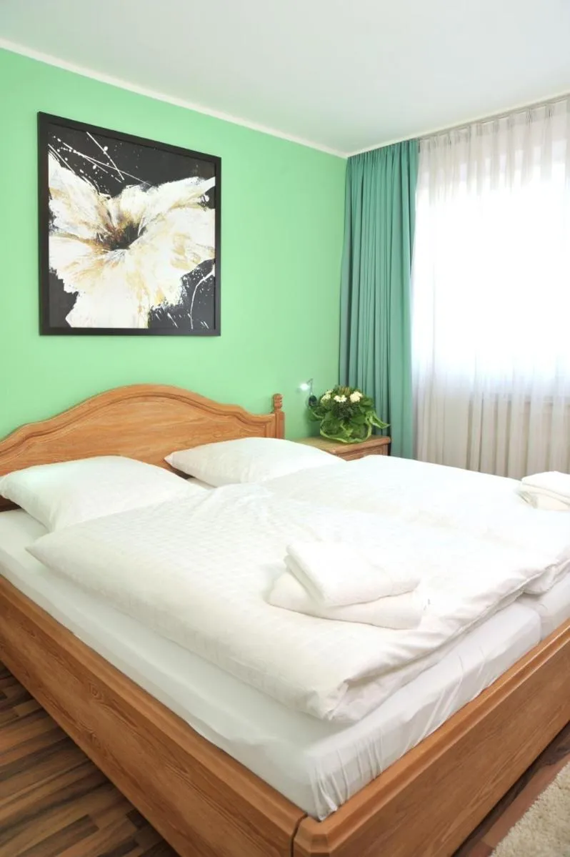 Bed in Stadthotel Langenfeld