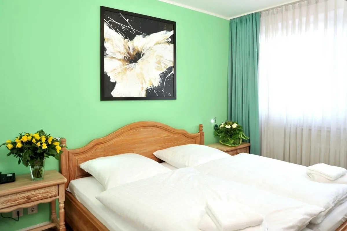 Bed in Stadthotel Langenfeld