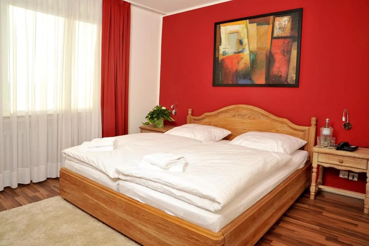 Bed in Stadthotel Langenfeld