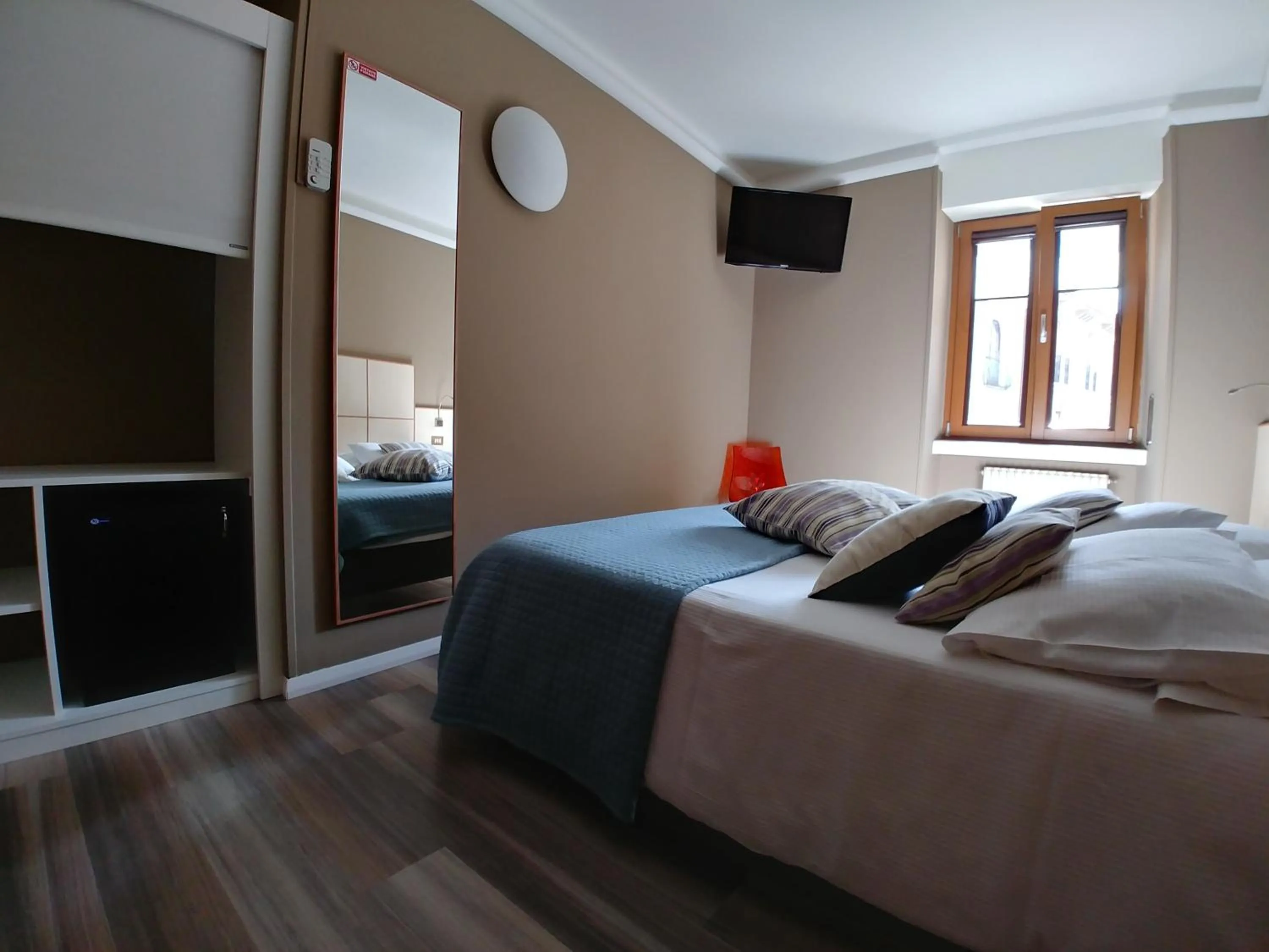 Bed in Albergo Aurora