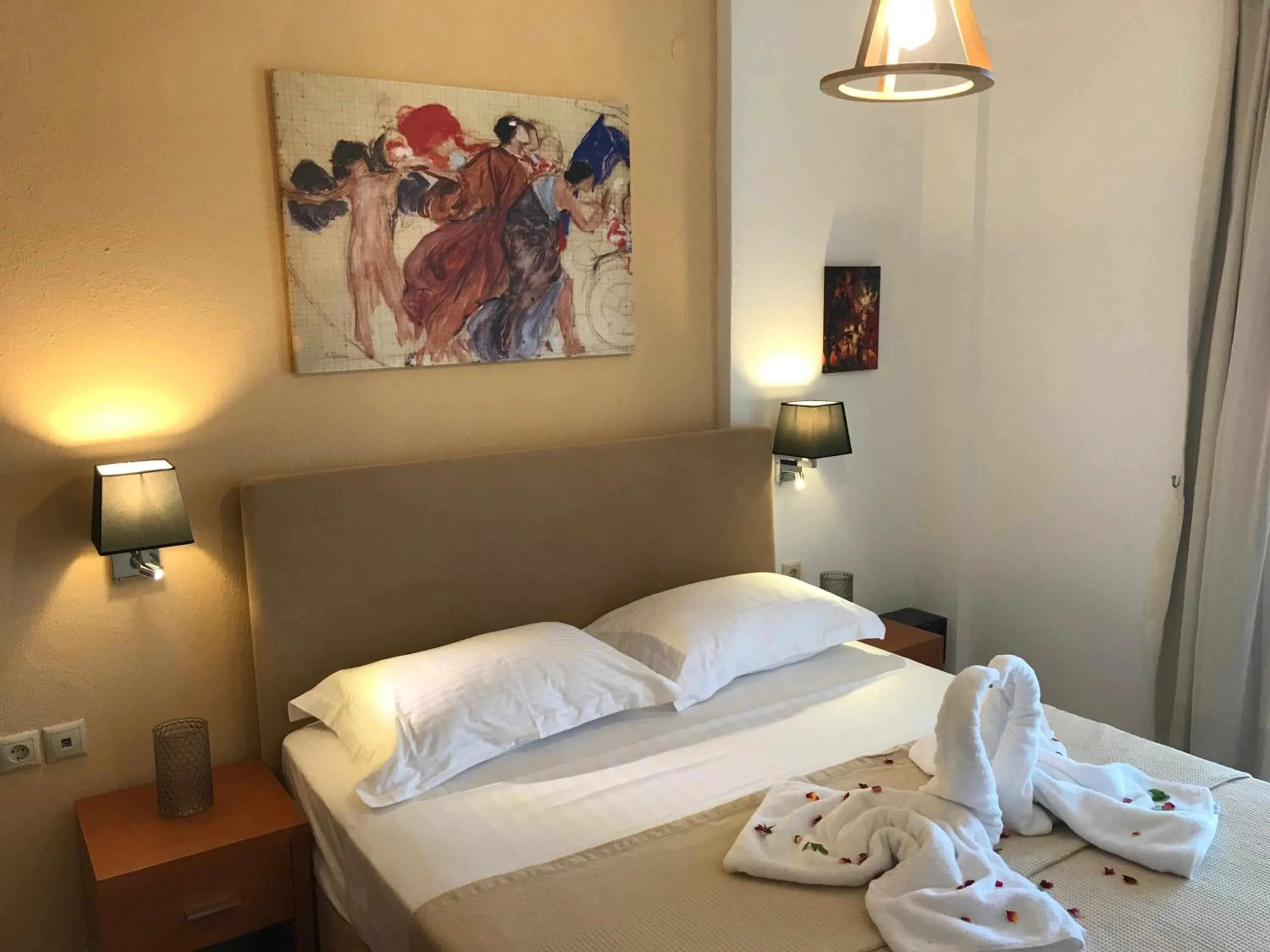 Bed in Koumaros Aparthotel