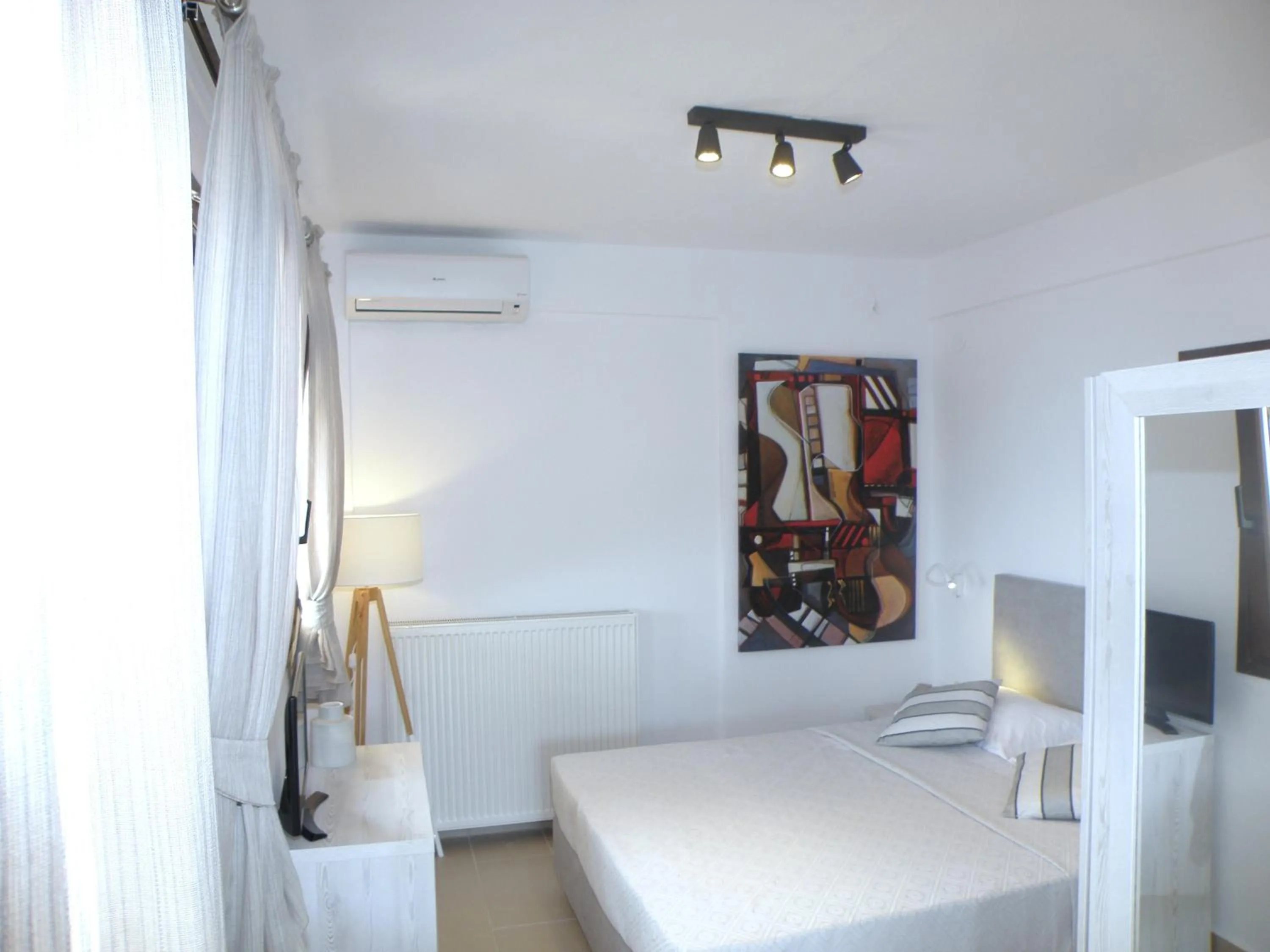 Bed in Koumaros Aparthotel