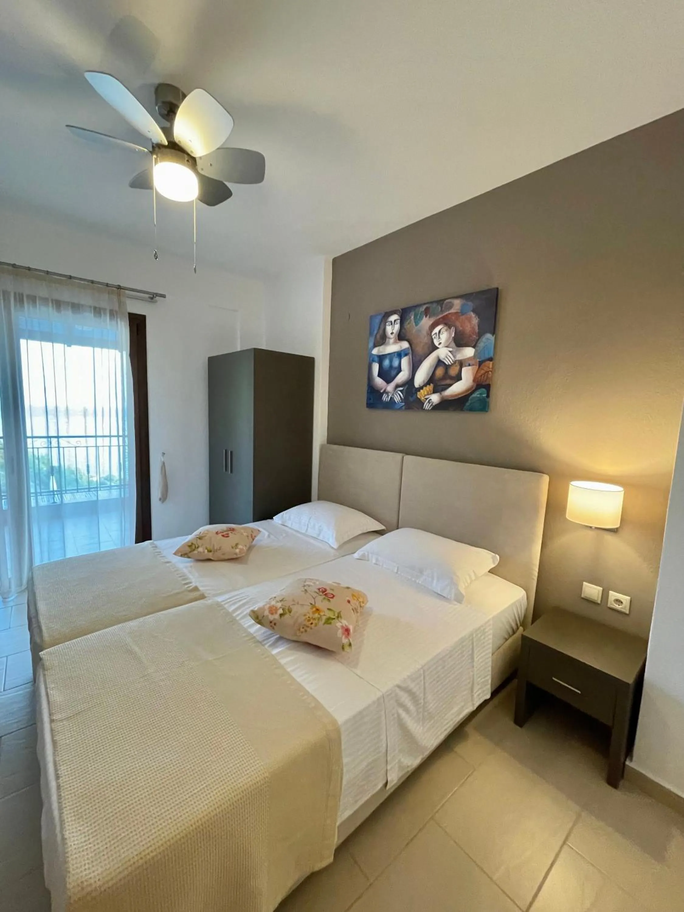 Bed in Koumaros Aparthotel